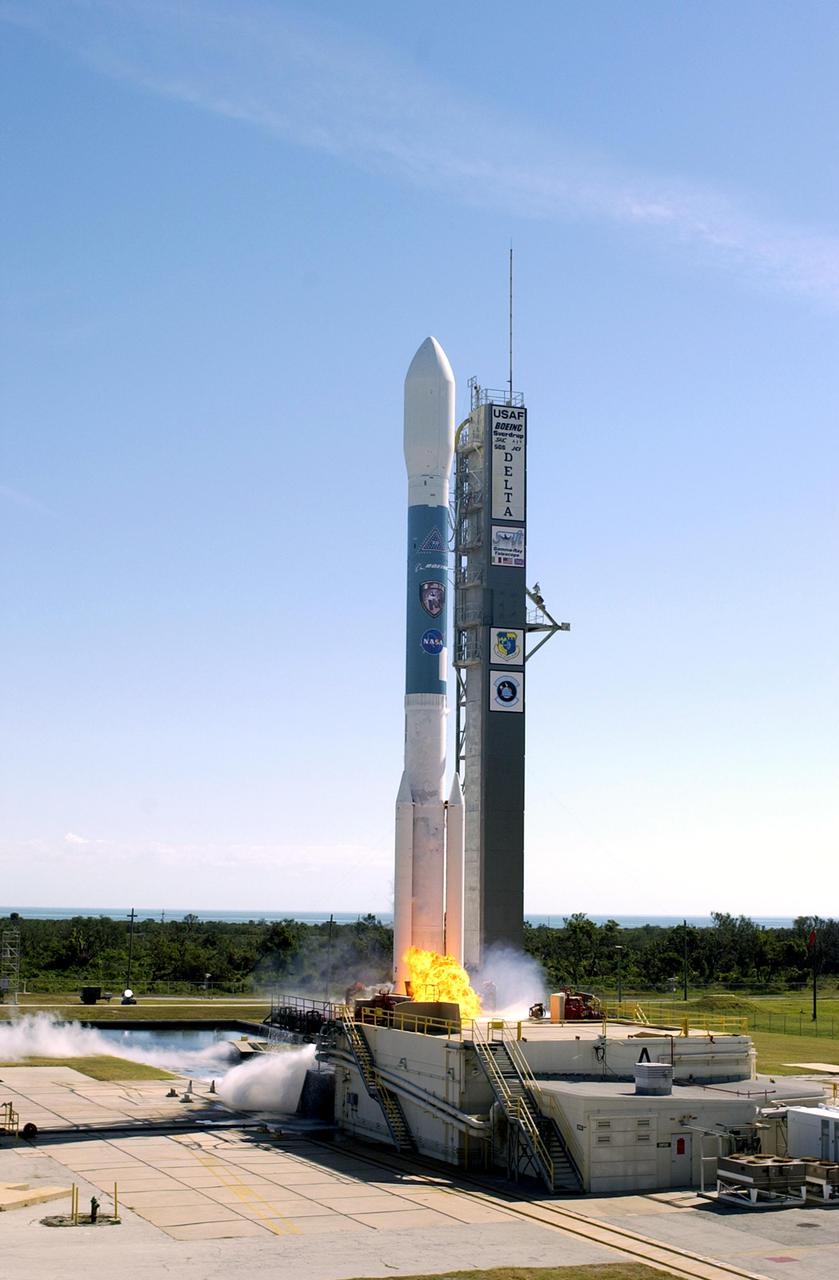 KENNEDY SPACE CENTER, FLA. -   NASA's Swift spacecraft lifts off from Complex 17A into the beautiful blue sky above Cape Canaveral Air Force Station on Nov. 20 at 12:16:00.611 p.m. EST aboard a Boeing Delta II expendable launch vehicle.  Swift is a first-of-its-kind multi-wavelength observatory dedicated to the study of gamma-ray burst science. Its three instruments will work together to observe GRBs and afterglows in the gamma ray, X-ray, ultraviolet and optical wavebands.