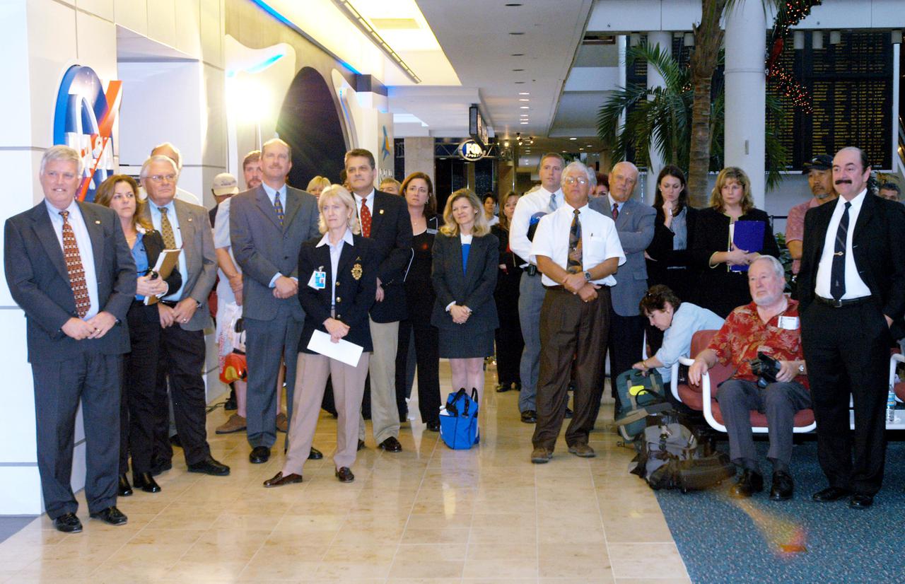 KENNEDY SPACE CENTER, FLA. -  A rapt audience listens to comments of Apollo 17 Commander Gene Cernan during the grand opening ceremony of the new Kennedy Space Center Store at Orlando International Airport.  At far left is Center Director Jim Kennedy, who also spoke during the ceremony.  The store will help educate millions of airport visitors about America’s space program and the Vision for Space Exploration.  The store is operated by Kennedy Space Center Visitor Complex concessionaire Delaware North Parks and Resorts.