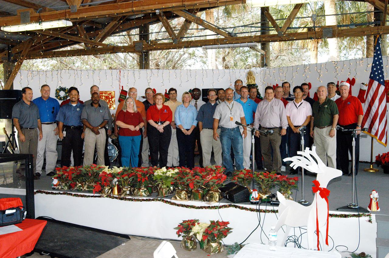 KENNEDY SPACE CENTER, FLA. -  Employees who worked on the Kennedy Space Center Combined Federal Campaign are recognized during the Center’s Holiday Celebration.  The 2004 campaign netted $389,000 to donate to the United Way of Brevard.