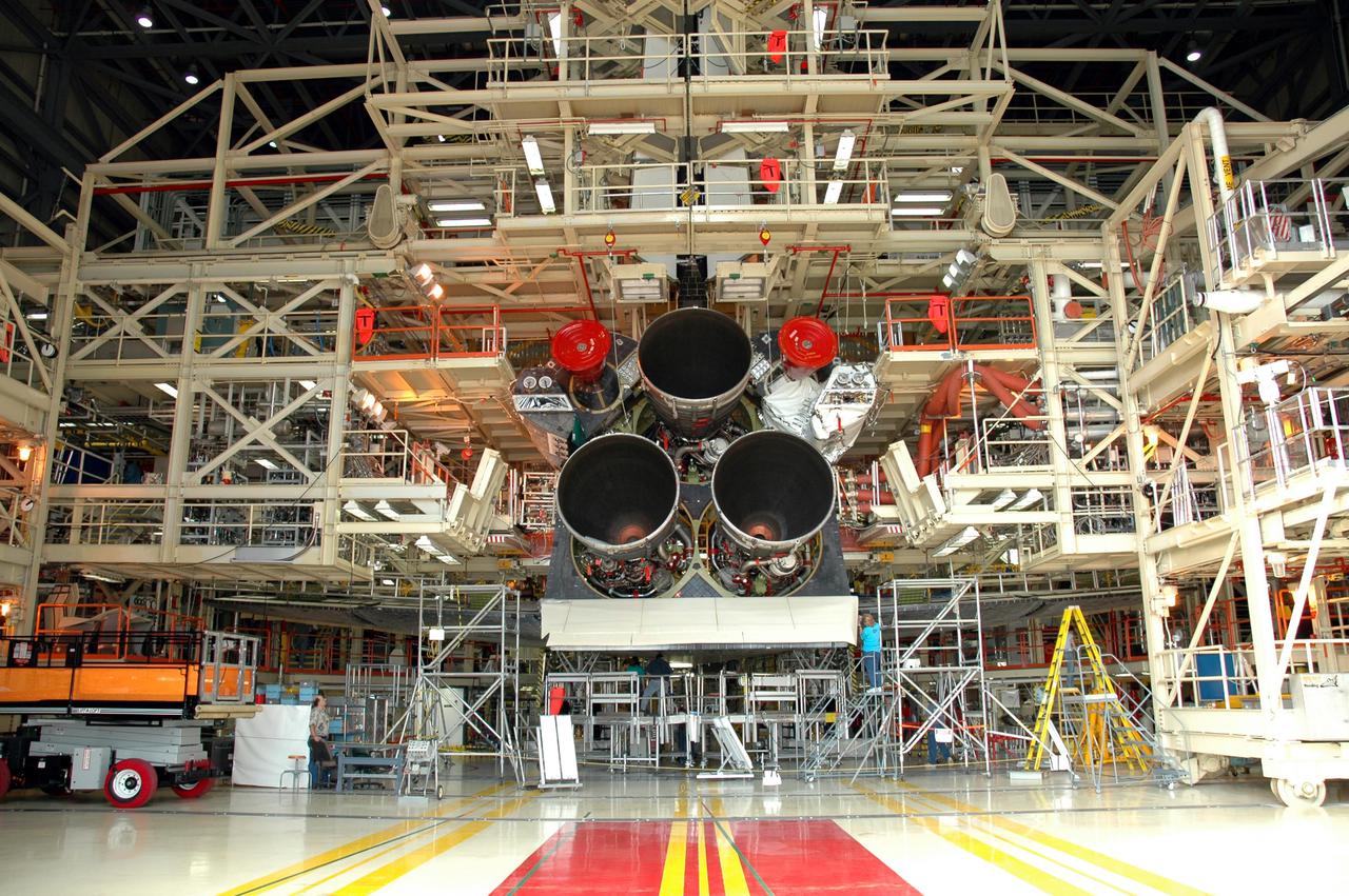KENNEDY SPACE CENTER, FLA. - In the Orbiter Processing Facility, the aft of Discovery is shown after the third Space Shuttle Main Engine (SSME) was installed. Discovery is designated as the Return to Flight vehicle for mission STS-114. Recent improvements to the SSME include the introduction of redesigned high-pressure turbopumps into the SSME fleet. The new pumps are designed and built by Pratt and Whitney at West Palm Beach, Fla. SSMEs and the Pratt and Whitney turbopumps are tested at Stennis Space Center in Mississippi. Engines and engine components are delivered to Kennedy Space Center to be prepared for flight.