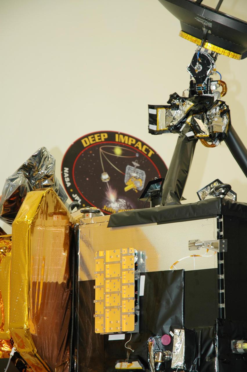 KENNEDY SPACE CENTER, FLA. - At Astrotech Space Operations in Titusville, Fla., the flight battery has been installed on the Deep Impact flyby spacecraft. About the size of a Ford Explorer, the flyby spacecraft is three-axis stabilized and uses a fixed solar array and a small NiH2 battery for its power system. A NASA Discovery mission, Deep Impact will probe beneath the surface of Comet Tempel 1 on July 4, 2005, when the comet is 83 million miles from Earth. During the encounter phase when the comet collides with the impactor projectile propelled into its path, the spacecraft’s high-gain antenna will transmit near-real-time images of the impact back to Earth. The spacecraft is scheduled to launch Jan. 8 aboard a Boeing Delta II rocket from Launch Complex 17-B at Cape Canaveral Air Force Station, Fla.