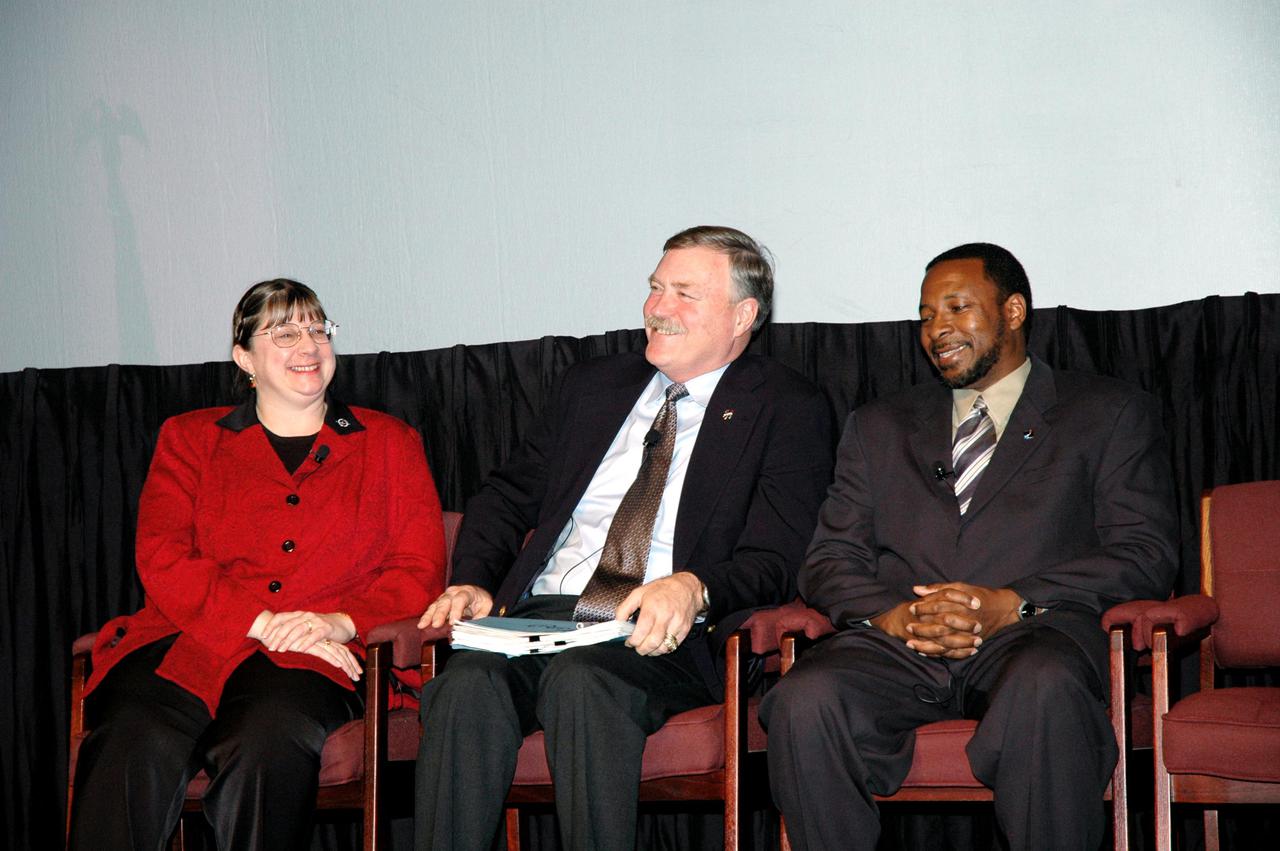 KENNEDY SPACE CENTER, FLA. - Activities at the One NASA Leader-Led Workshop included a panel to answer questions from the audience. Seated here are Lynn Cline, deputy associate administrator for Space Operations, Adm. Craig Steidle, associate administrator for Exploration Systems, and Woodrow Whitlow Jr., Kennedy deputy director. The workshop included senior leadership in the Agency who talked about ongoing Transformation activities and Kennedy’s role in the Vision for Space Exploration.