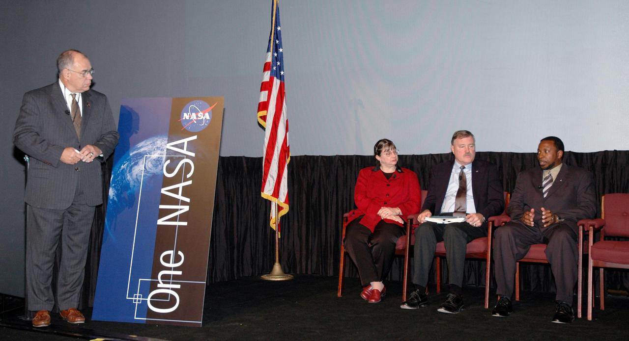 KENNEDY SPACE CENTER, FLA. -  NASA Deputy Administrator Fred Gregory (left) moderates the panel presentation during the One NASA Leader-Led Workshop about the Agency’s Transformation and implementation strategies.  Seated at right are panel members Lynn Cline, deputy associate administrator for Space Operations, Adm. Craig Steidle, associate administrator for Exploration Systems, and Woodrow Whitlow Jr., Kennedy deputy director.  The workshop included senior leadership in the Agency who talked about ongoing Transformation activities and Kennedy’s role in the Vision for Space Exploration.