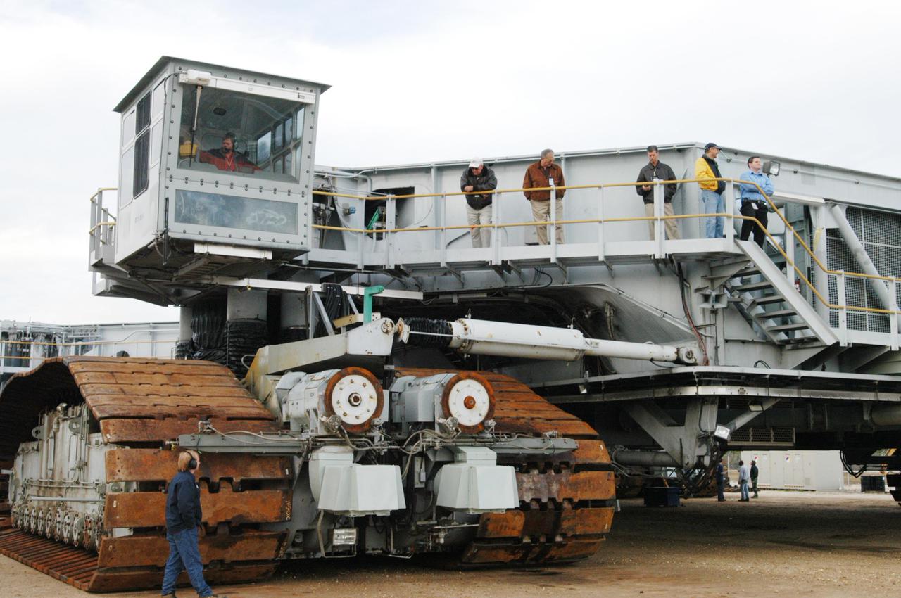 KENNEDY SPACE CENTER, FLA. - The newly shod Crawler Transporter is ready for a road test. The Crawler Transporter that will move Space Shuttle Discovery to the launch pad for Return to Flight is taking its first road test following the replacement of all its shoes. The crawlers have 456 shoes, 57 per belt (8 belts in all). Each shoe weighs 2,200 pounds. Cracks appeared in the shoes in recent years, spurring a need for replacement. The new manufacturer, in Duluth, Minn., has improved the design for a safe Return to Flight and use through the balance of the Space Shuttle Program.