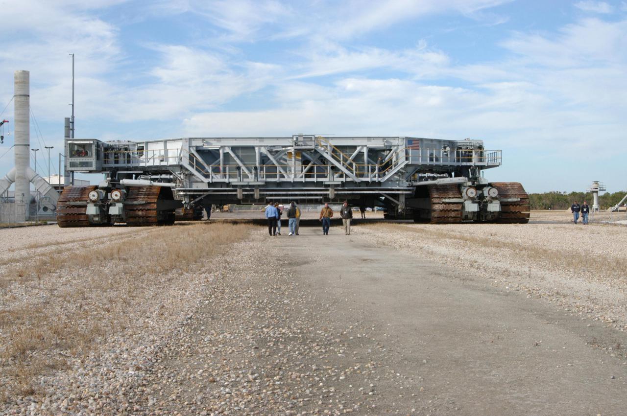 KENNEDY SPACE CENTER, FLA. - The newly shod Crawler Transporter is ready for its road test. The Crawler Transporter that will move Space Shuttle Discovery to the launch pad for Return to Flight is taking its first road test following the replacement of all its shoes. The crawlers have 456 shoes, 57 per belt (8 belts in all). Each shoe weighs 2,200 pounds. Cracks appeared in the shoes in recent years, spurring a need for replacement. The new manufacturer, in Duluth, Minn., has improved the design for a safe Return to Flight and use through the balance of the Space Shuttle Program.
