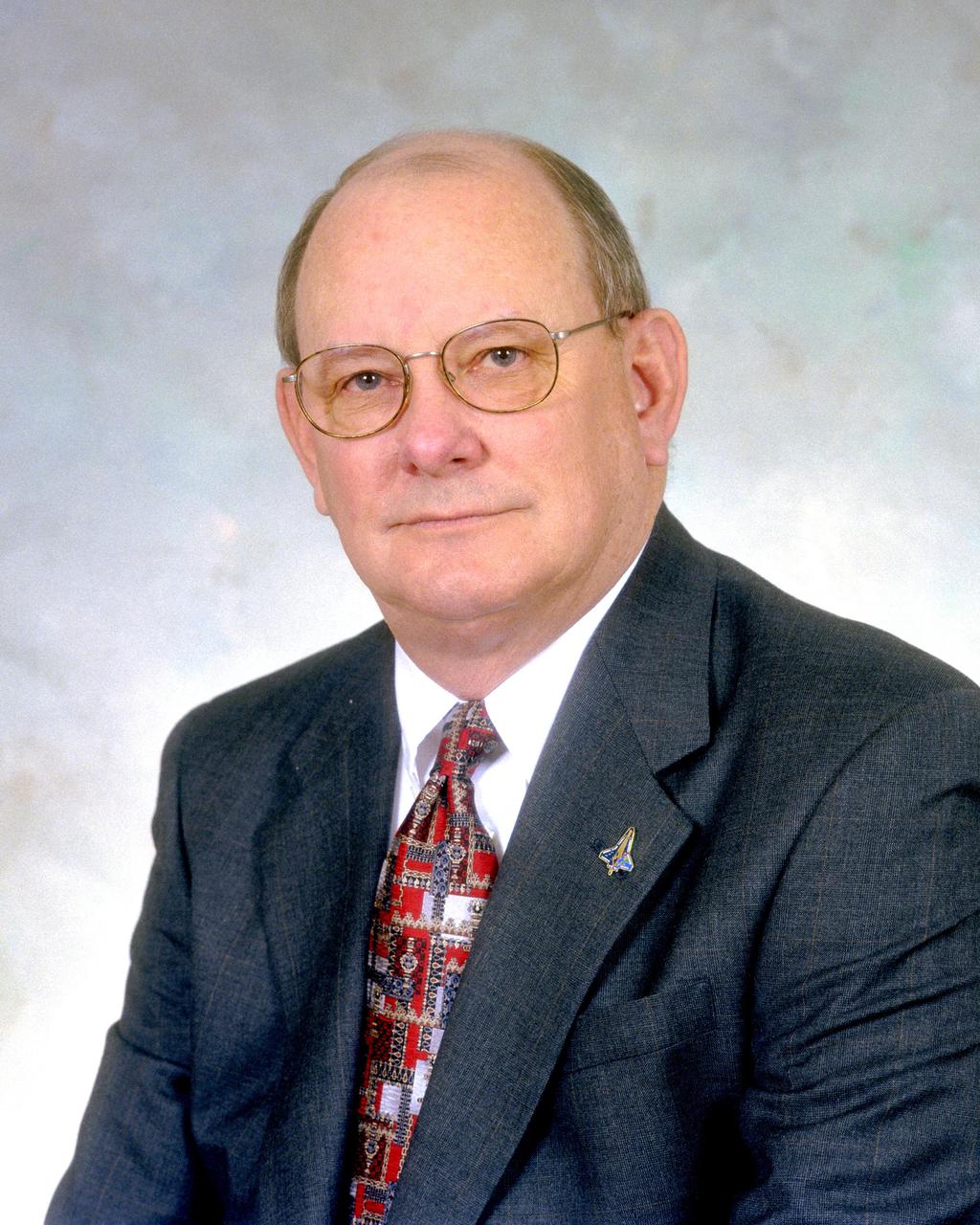 KENNEDY SPACE CENTER, FLA. - Official portrait of James E. Hattaway Jr., associate director of the John F. Kennedy Space Center (KSC).. Prior to this assignment, he was the director of the Procurement Office at KSC.