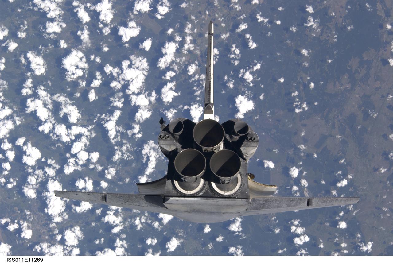 Launched on July 26, 2005 from the Kennedy Space Center in Florida, STS-114 was classified as Logistics Flight 1. Among the Station-related activities of the mission were the delivery of new supplies and the replacement of one of the orbital outpost's Control Moment Gyroscopes (CMGs). STS-114 also carried the Raffaello Multi-Purpose Logistics Module and the External Stowage Platform-2. A major focus of the mission was the testing and evaluation of new Space Shuttle flight safety, which included new inspection and repair techniques. Upon its approach to the International Space Station (ISS), the Space Shuttle Discovery underwent a photography session in order to assess any damages that may have occurred during its launch and/or journey through Space. Discovery was over Switzerland, about 600 feet from the ISS, when Cosmonaut Sergei K. Kriklev, Expedition 11 Commander, and John L. Phillips, NASA Space Station officer and flight engineer photographed the spacecraft as it performed a back flip to allow photography of its heat shield. Astronaut Eileen M. Collins, STS-114 Commander, guided the shuttle through the flip. The photographs were analyzed by engineers on the ground to evaluate the condition of Discovery’s heat shield. The crew safely returned to Earth on August 9, 2005. The mission historically marked the Return to Flight after nearly a two and one half year delay in flight after the Space Shuttle Columbia tragedy in February 2003.