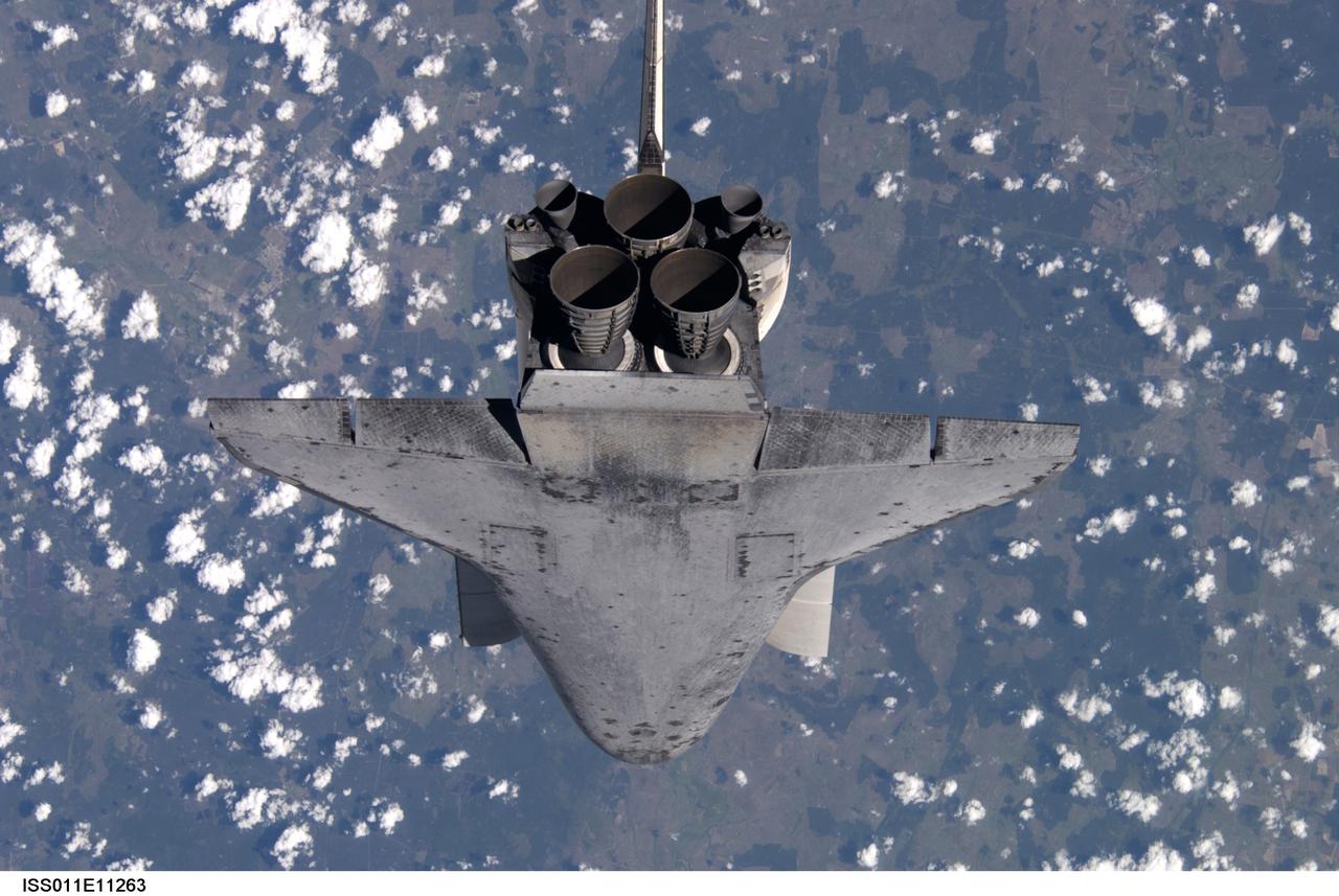 Launched on July 26, 2005 from the Kennedy Space Center in Florida, STS-114 was classified as Logistics Flight 1. Among the Station-related activities of the mission were the delivery of new supplies and the replacement of one of the orbital outpost's Control Moment Gyroscopes (CMGs). STS-114 also carried the Raffaello Multi-Purpose Logistics Module and the External Stowage Platform-2. A major focus of the mission was the testing and evaluation of new Space Shuttle flight safety, which included new inspection and repair techniques. Upon its approach to the International Space Station (ISS), the Space Shuttle Discovery underwent a photography session in order to assess any damages that may have occurred during its launch and/or journey through Space. Discovery was over Switzerland, about 600 feet from the ISS, when Cosmonaut Sergei K. Kriklev, Expedition 11 Commander, and John L. Phillips, NASA Space Station officer and flight engineer photographed the under side of the spacecraft as it performed a back flip to allow photography of its heat shield. Astronaut Eileen M. Collins, STS-114 Commander, guided the shuttle through the flip. The photographs were analyzed by engineers on the ground to evaluate the condition of Discovery’s heat shield. The crew safely returned to Earth on August 9, 2005. The mission historically marked the Return to Flight after nearly a two and one half year delay in flight after the Space Shuttle Columbia tragedy in February 2003.