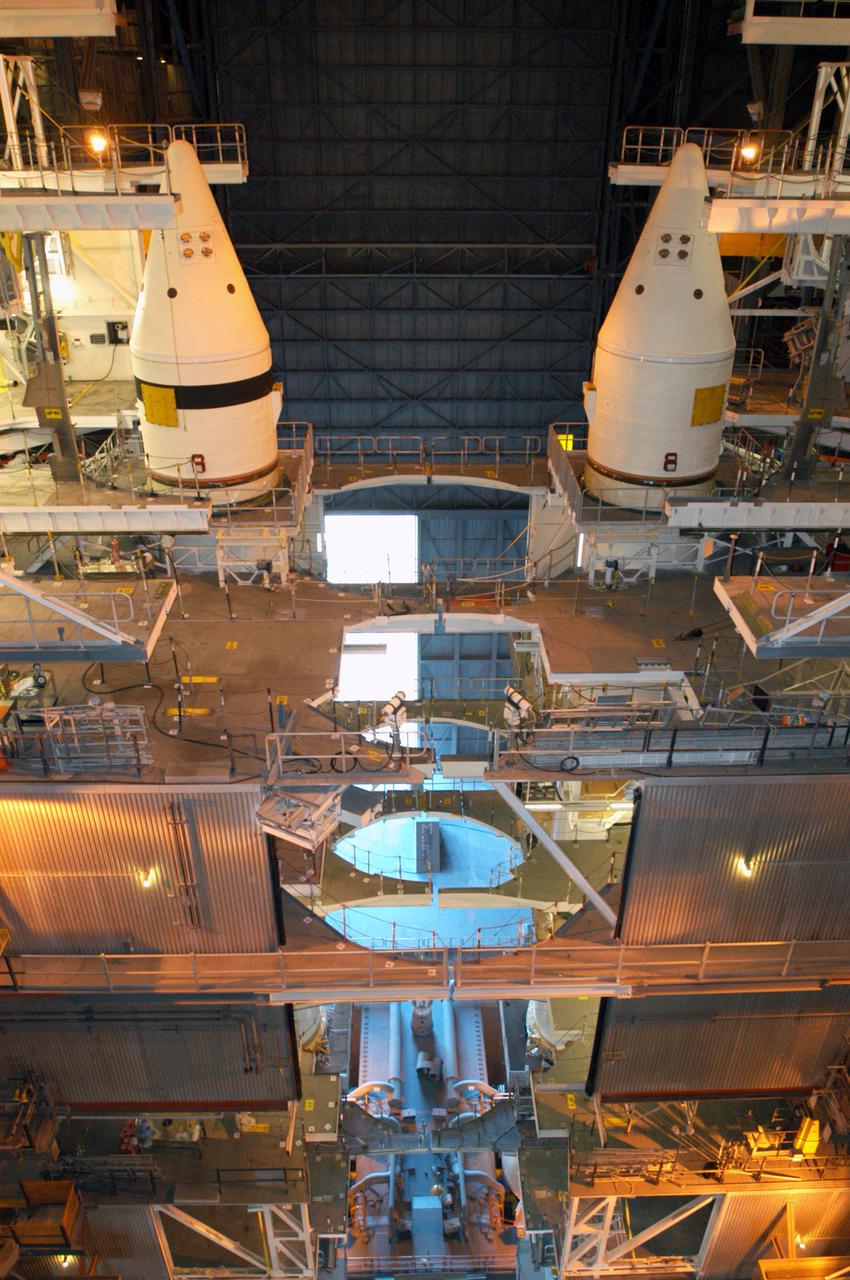 KENNEDY SPACE CENTER, FLA. - From high inside the Vehicle Assembly Building are seen twin Solid Rocket Boosters stacked on a Mobile Launcher Platform. The SRBs will be flying on Space Shuttle Discovery for Return to Flight mission STS-114. The launch planning window is May 12 to June 3, 2005.
