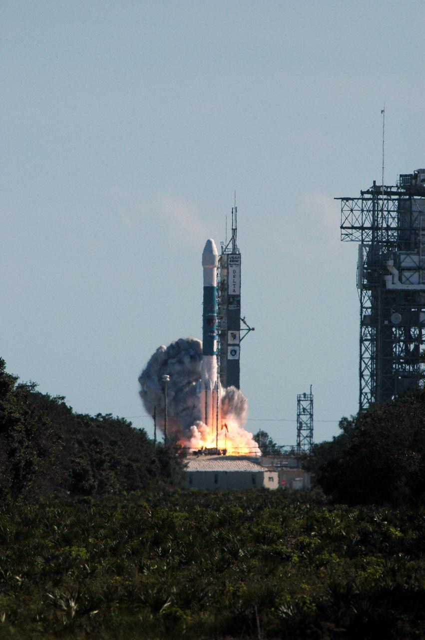 KENNEDY SPACE CENTER, FLA.  -  With a burst of flames, NASA’s Deep Impact spacecraft lifts off at 1:47 p.m. EST today from Launch Pad 17-B, Cape Canaveral Air Force Station, Fla.  A NASA Discovery mission, Deep Impact is heading for space and a rendezvous 83 million miles from Earth with Comet Tempel 1.  After releasing a 3- by 3-foot projectile (impactor) to crash onto the surface July 4, 2005, Deep Impact’s flyby spacecraft will reveal the secrets of the comet’s interior by collecting pictures and data of how the crater forms, measuring the crater’s depth and diameter as well as the composition of the interior of the crater and any material thrown out, and determining the changes in natural outgassing produced by the impact.  It will send the data back to Earth through the antennas of the Deep Space Network.