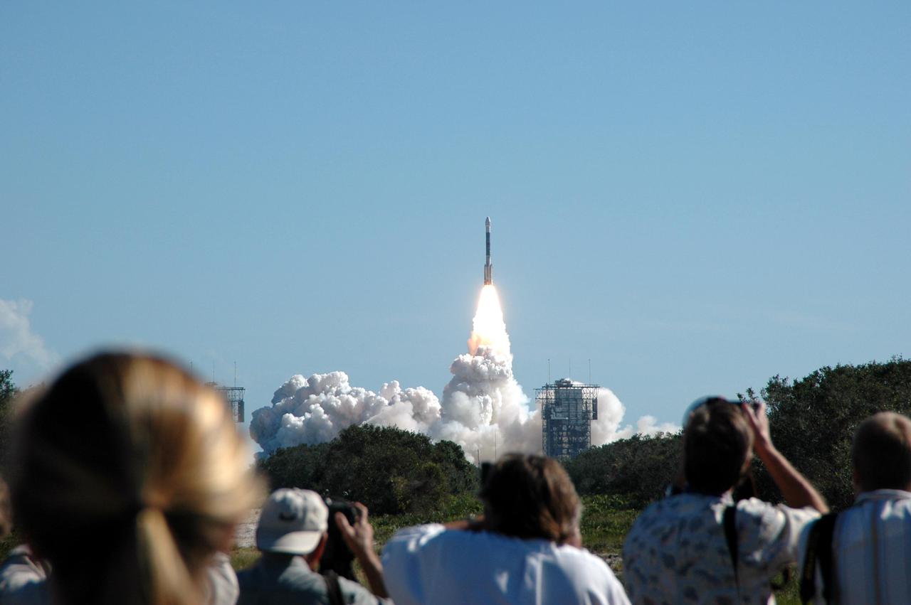 KENNEDY SPACE CENTER, FLA. - From the nearby Press Site at Cape Canaveral Air Force Station, Fla., photographers capture the exciting launch of the Deep Impact spacecraft at 1:47 p.m. EST. A NASA Discovery mission, Deep Impact is heading for space and a rendezvous 83 million miles from Earth with Comet Tempel 1. After releasing a 3- by 3-foot projectile (impactor) to crash onto the surface July 4, 2005, Deep Impact’s flyby spacecraft will reveal the secrets of the comet’s interior by collecting pictures and data of how the crater forms, measuring the crater’s depth and diameter as well as the composition of the interior of the crater and any material thrown out, and determining the changes in natural outgassing produced by the impact. It will send the data back to Earth through the antennas of the Deep Space Network.