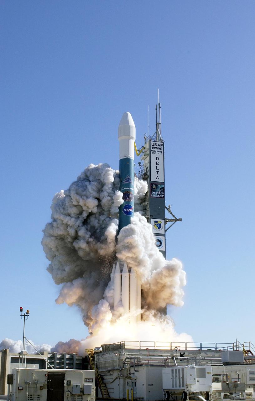 KENNEDY SPACE CENTER, FLA.  -  Engulfed by flames and smoke, NASA’s Deep Impact spacecraft lifts off at 1:47 p.m. EST today from Launch Pad 17-B, Cape Canaveral Air Force Station, Fla.  A NASA Discovery mission, Deep Impact is heading for space and a rendezvous 83 million miles from Earth with Comet Tempel 1.  After releasing a 3- by 3-foot projectile (impactor) to crash onto the surface July 4, 2005, Deep Impact’s flyby spacecraft will reveal the secrets of the comet’s interior by collecting pictures and data of how the crater forms, measuring the crater’s depth and diameter as well as the composition of the interior of the crater and any material thrown out, and determining the changes in natural outgassing produced by the impact.  It will send the data back to Earth through the antennas of the Deep Space Network.