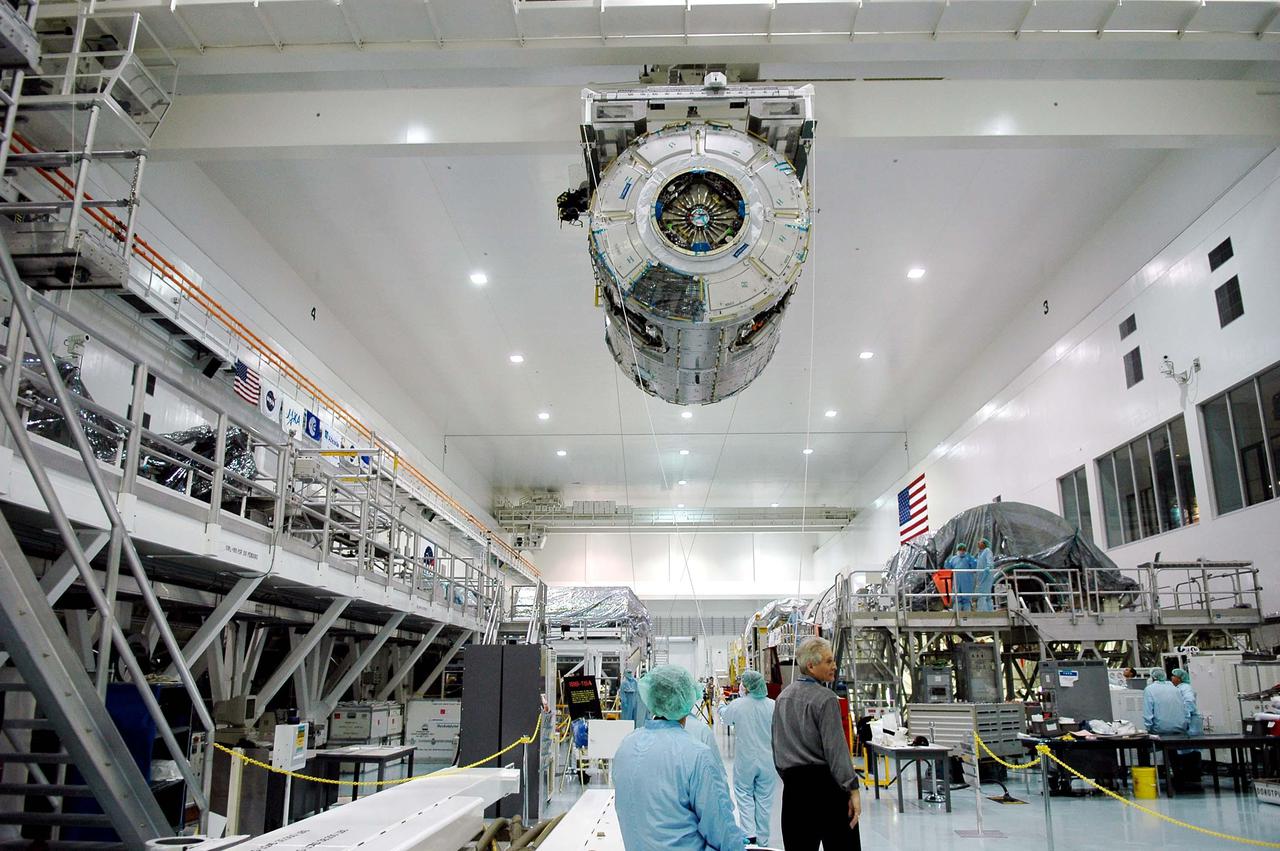 KENNEDY SPACE CENTER, FLA.  - The International Space Station module Node 2 moves along the top of the Space Station Processing Facility.  The module is being moved to a payload canister for transfer to the Operations and Checkout Building.  There it will undergo an element leak test. The installation of NASA's Node 2 will denote the U.S. Core Complete stage of International Space Station assembly and increase the living and working space inside the station to approximately 18,000 cubic feet. It also will allow the addition of international laboratories from Europe and Japan to the station.  Node 2 will provide a passageway between four station science experiment facilities: the U.S. Destiny Laboratory, the Kibo Japanese Experiment Module, the European Columbus Laboratory and the Centrifuge Accommodation Module. It also will provide connecting ports for Multi-Purpose Logistics Modules, the Japanese H II Transfer Vehicle and the Pressurized Mating Adapter 2 to which Space Shuttles dock. The Space Station Robotic Arm, Canadarm2, can operate from a powered grapple fixture on the exterior of Node 2.  It is scheduled for launch on shuttle mission STS-120, station assembly flight 10A.