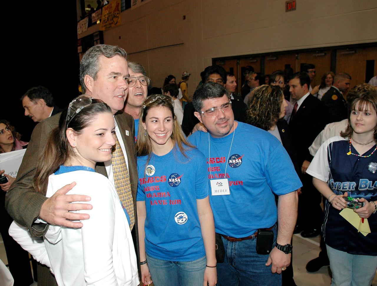 KENNEDY SPACE CENTER, FLA. - At the 2005 FIRST Robotics Regional Competition held at the University of Central Florida March 10-12, Florida Gov. Jeb Bush meets members of NASA-sponsored Team 1029, the WolvCats, from Miami. The team comprises students from Belen Jesuit Preparatory School and Our Lady of Lourdes Academy.