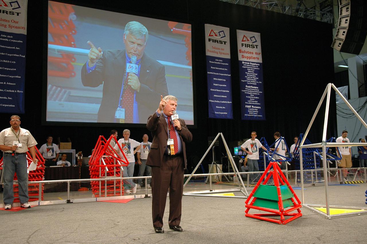 KENNEDY SPACE CENTER, FLA.  - Center Director Jim Kennedy kicks off the 2005 FIRST Robotics Regional Competition held at the University of Central Florida March 10-12. NASA and the University of Central Florida are co-hosts of the regional event. The competition stages short games played by remote-controlled robots, which are designed and built in six weeks by a team of high school students and a handful of engineers-mentors. The students control the robots on the playing field.