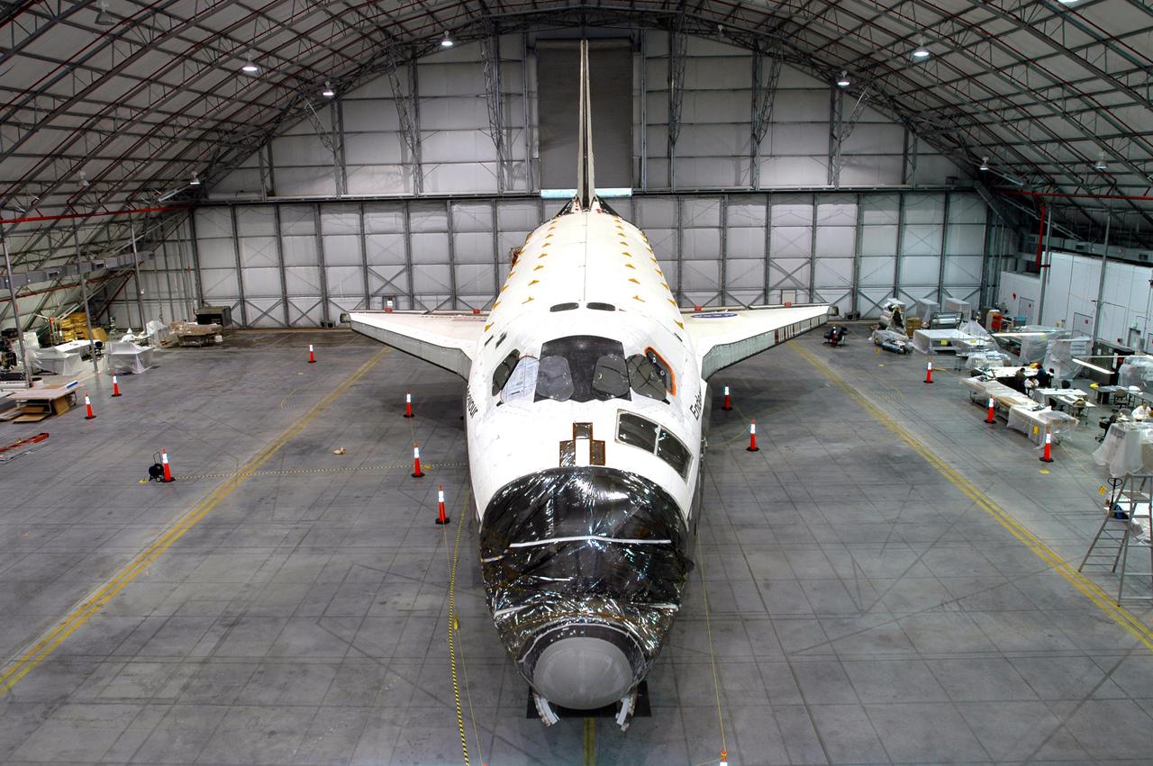 KENNEDY SPACE CENTER, FLA.  - An overview of the orbiter Endeavour is shown as it sits inside the Florida Space Authority’s Reusable Launch Vehicle hangar at NASA’s Kennedy Space Center.  While in the hangar, Endeavour has undergone testing to see how orbiters respond to a new radar system that will be used during launch to detect debris.  Endeavour is returning to the Orbiter Processing Facility today to continue Orbiter Major Modifications (OMM).  OMMs are scheduled at regular intervals to enhance safety and performance, infuse new technology, and, in this case, perform Return to Flight modifications.