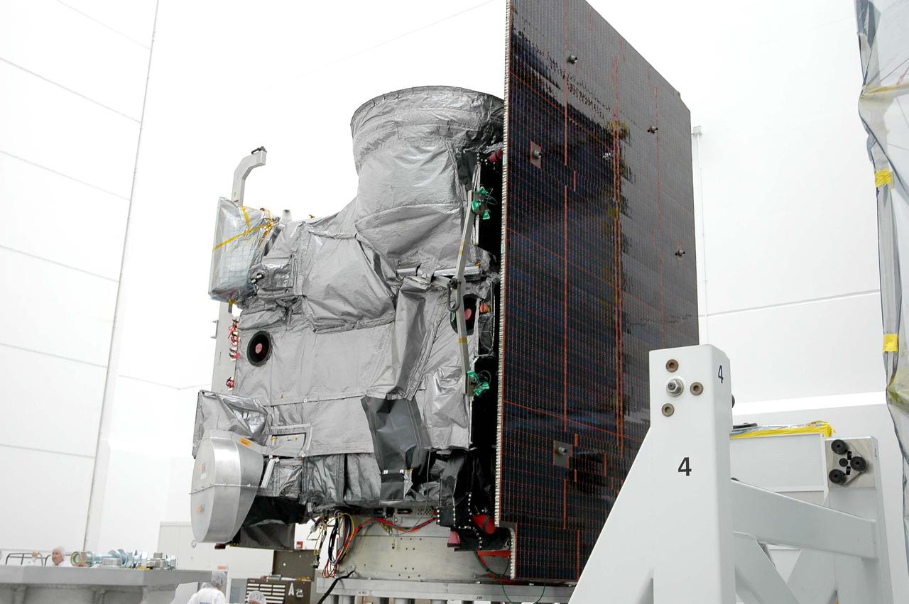 KENNEDY SPACE CENTER, FLA. - At Astrotech in Titusville, Fla., the GOES-N satellite waits to be attached to a crane that will lift and move it to a work stand. Since its arrival on March 11, the satellite has been undergoing final testing by Boeing Satellite Systems of the imaging system, instrumentation, communications and power systems. Geostationary Operational Environmental Satellites (GOES) are sponsored by NASA’s Goddard Space Flight Center and the National Oceanic and Atmospheric Administration. GOES-N is targeted to launch May 4 onboard a Boeing expendable launch vehicle Delta IV (4,2) with a 3-burn second stage operation.