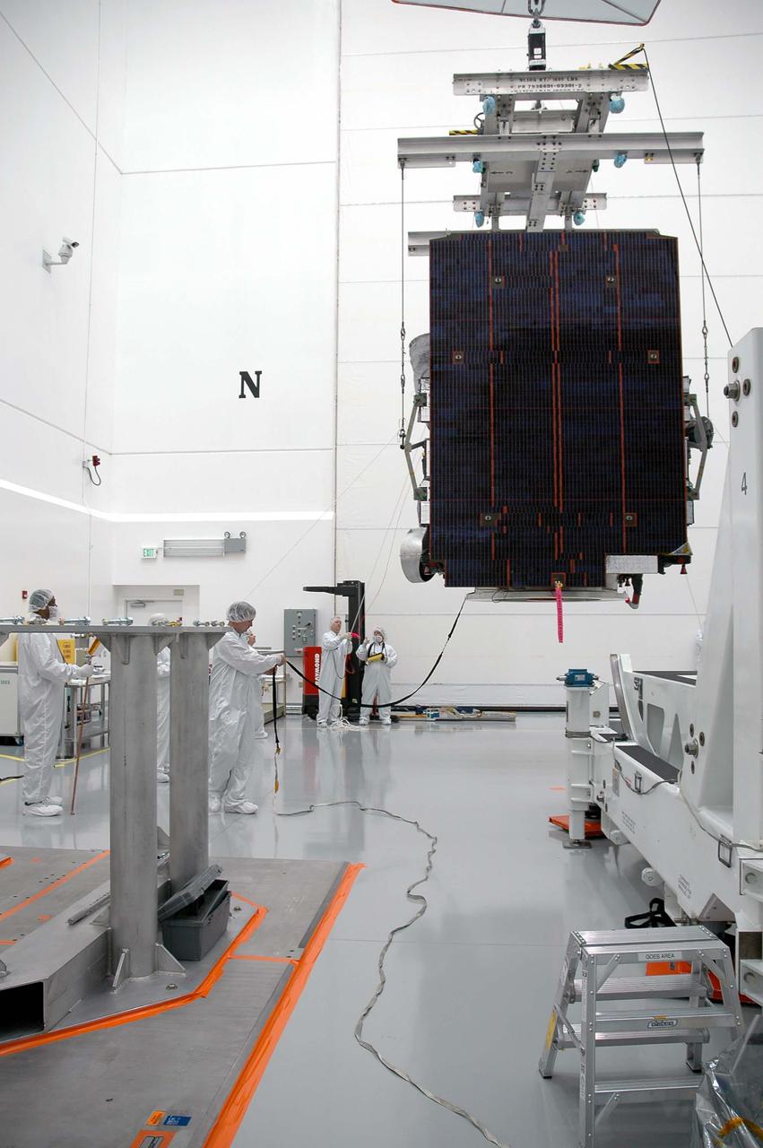 KENNEDY SPACE CENTER, FLA. - At Astrotech in Titusville, Fla., the overhead crane moves the GOES-N satellite away from the rotation stand for transfer to a work stand.  Since its arrival on March 11, the satellite has been undergoing final testing by Boeing Satellite Systems of the imaging system, instrumentation, communications and power systems. Geostationary Operational Environmental Satellites (GOES) are sponsored by NASA’s Goddard Space Flight Center and the National Oceanic and Atmospheric Administration. GOES-N is targeted to launch May 4 onboard a Boeing expendable launch vehicle Delta IV (4,2) with a 3-burn second stage operation.