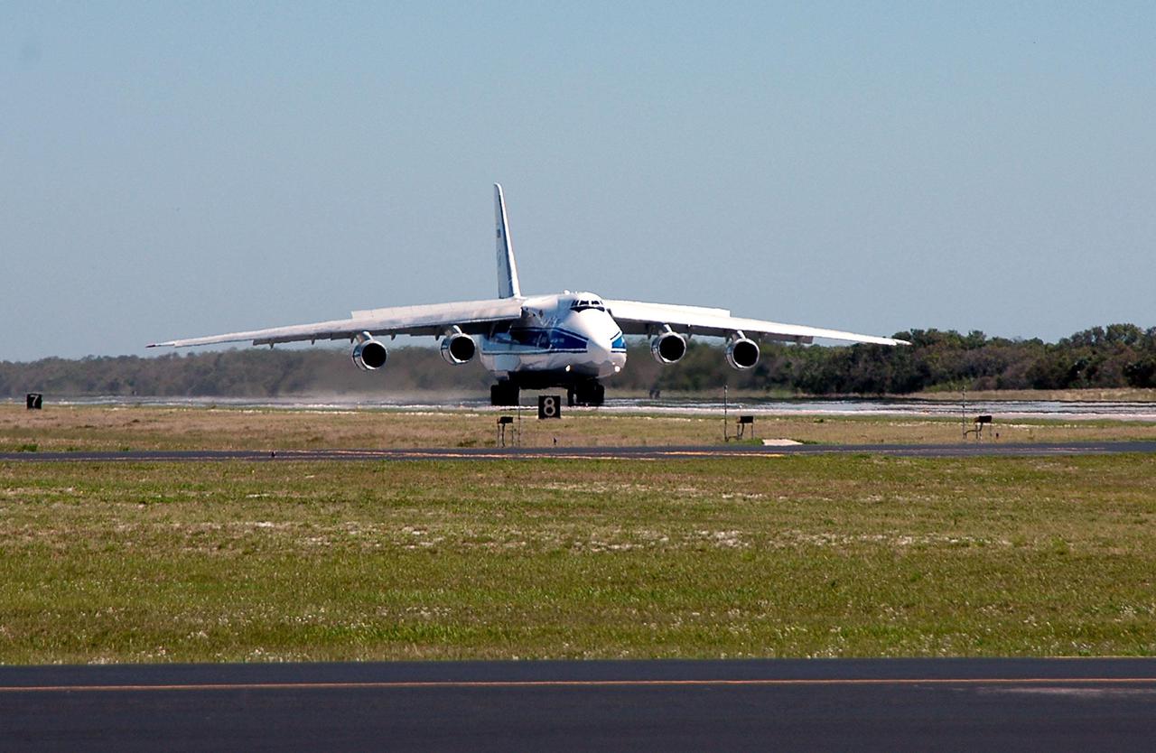 KENNEDY SPACE CENTER, FLA. -  A Russian Antonov AH-124-100 cargo airplane lands at the Cape Canaveral Air Force Station Skid Strip.  The plane is delivering a second stage Centaur for the Lockheed Martin Atlas V, designated AV-007, that is the launch vehicle for the Mars Reconnaissance Orbiter (MRO).  The MRO is designed for a series of global mapping, regional survey and targeted observations from a near-polar, low-altitude Mars orbit. These observations will be unprecedented in terms of the spatial resolution and coverage achieved by the orbiter’s instruments as they observe the atmosphere and surface of Mars while probing its shallow subsurface as part of a “follow the water” strategy.  The orbiter is undergoing environmental tests in facilities at Lockheed Martin Space Systems in Denver, Colo., and is on schedule for a launch window that begins Aug. 10. Launch will be from Launch Pad 41 at Cape Canaveral Air Force Station in Florida.