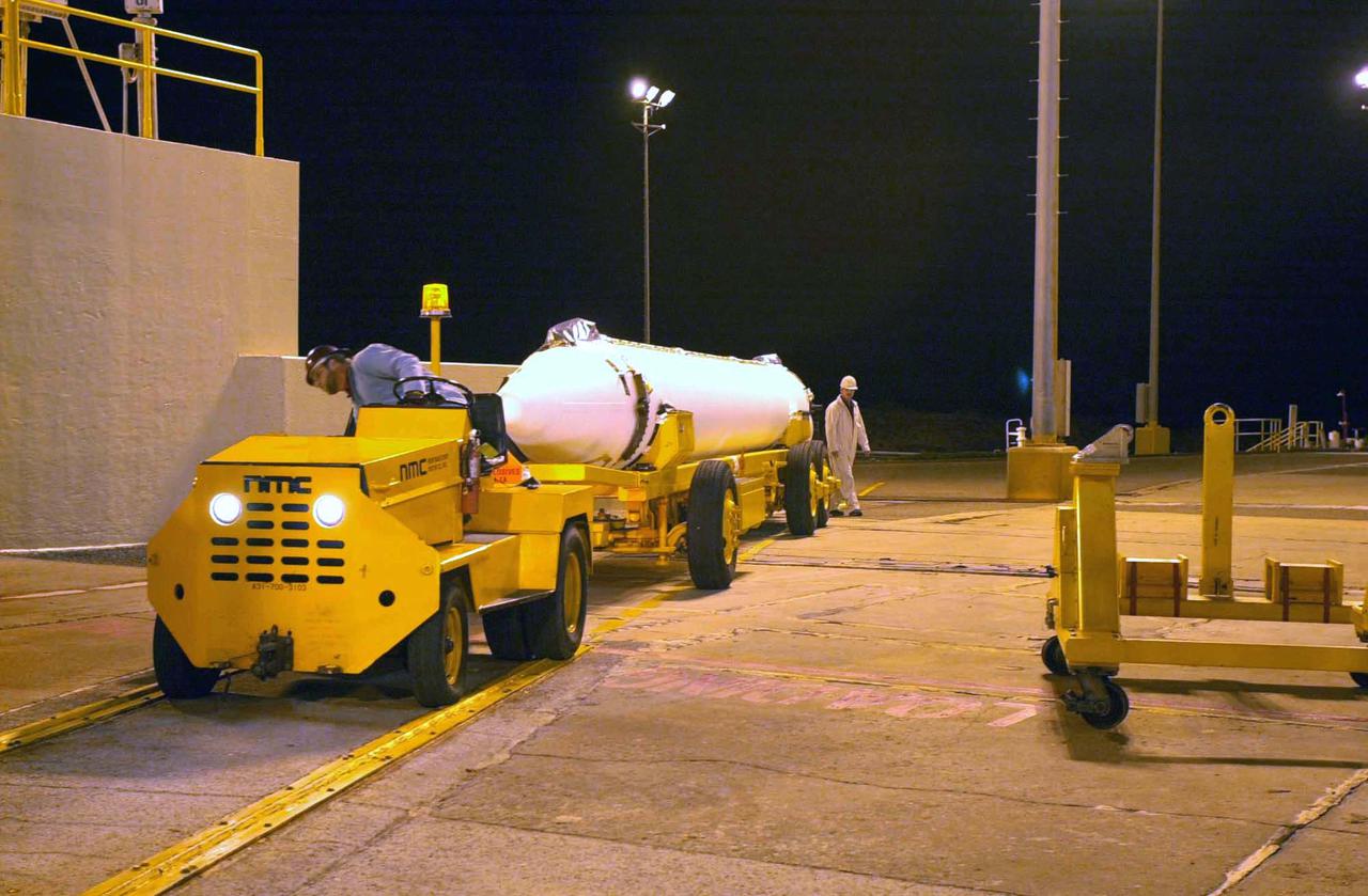 VANDENBERG AIR FORCE BASE, CALIF. -  One of three Solid Rocket Boosters arrives at Space Launch Complex 2 on Vandenberg Air Force Base in California.  It will be mated with a Boeing Delta II rocket for the launch of the National Oceanic and Atmospheric Administration (NOAA-N) spacecraft.   Launch of NOAA-N aboard the Boeing Delta II rocket is currently scheduled for May 11, 2005.  NOAA-N is the fourth in the series of support dedicated microwave instruments for the generation of temperature, moisture, surface, and hydrological products in cloudy regions where visible and infrared (IR) instruments have decreased capability.
