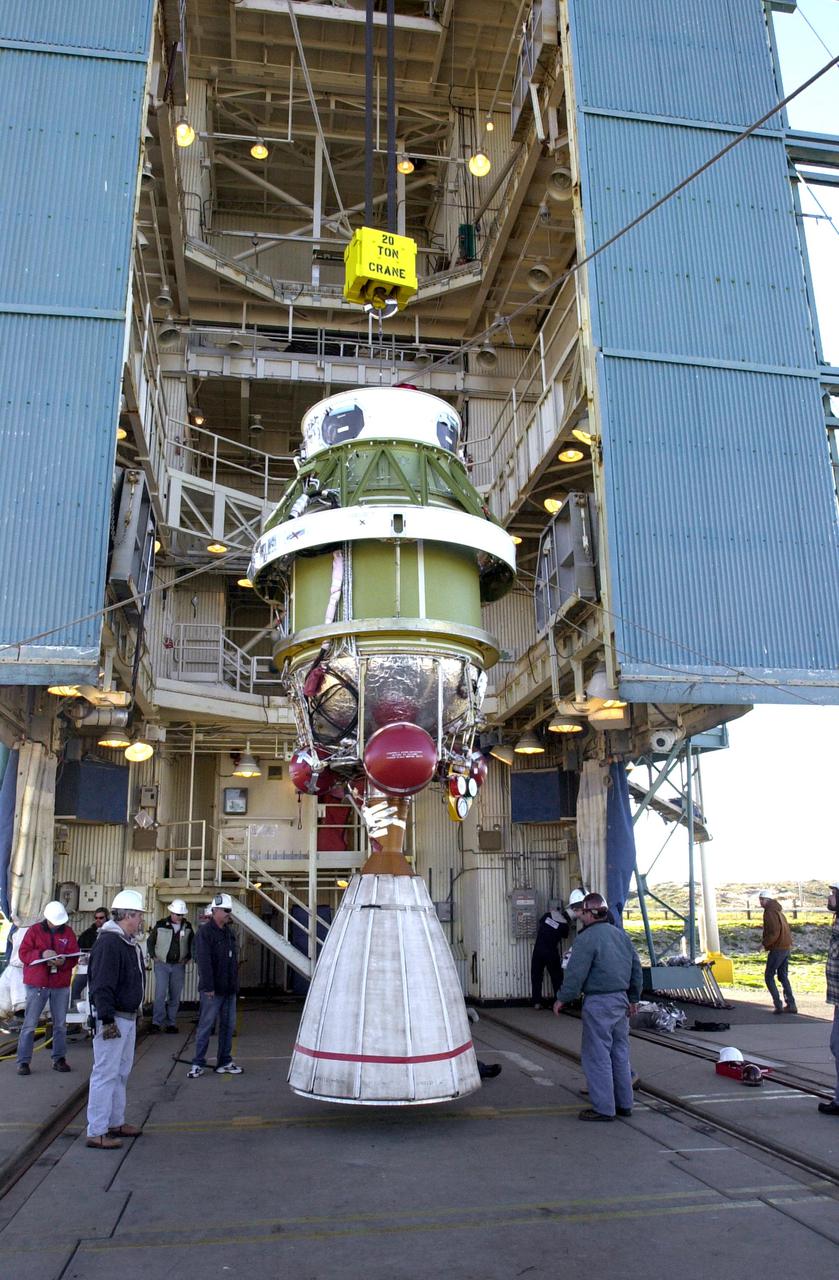 VANDENBERG AIR FORCE BASE, CALIF. - At Space Launch Complex 2 on Vandenberg Air Force Base in California, the second stage of the Boeing Delta II rocket is now suspended vertically and can be lifted up the service tower for mating with the first stage. The Delta II will launch the National Oceanic and Atmospheric Administration (NOAA-N) spacecraft. After launch, NOAA-N will be renamed NOAA-18 and will provide measurements of the Earth's surface and atmosphere that will be entered into NOAA’s weather forecasting models and used for other environmental studies. Each day, the satellite will send data to NOAA’s Command and Data Acquisition station computers, adding vital information to forecasting models, especially over the oceans, where conventional data is lacking. Launch of NOAA-N is scheduled for May 11, 2005.