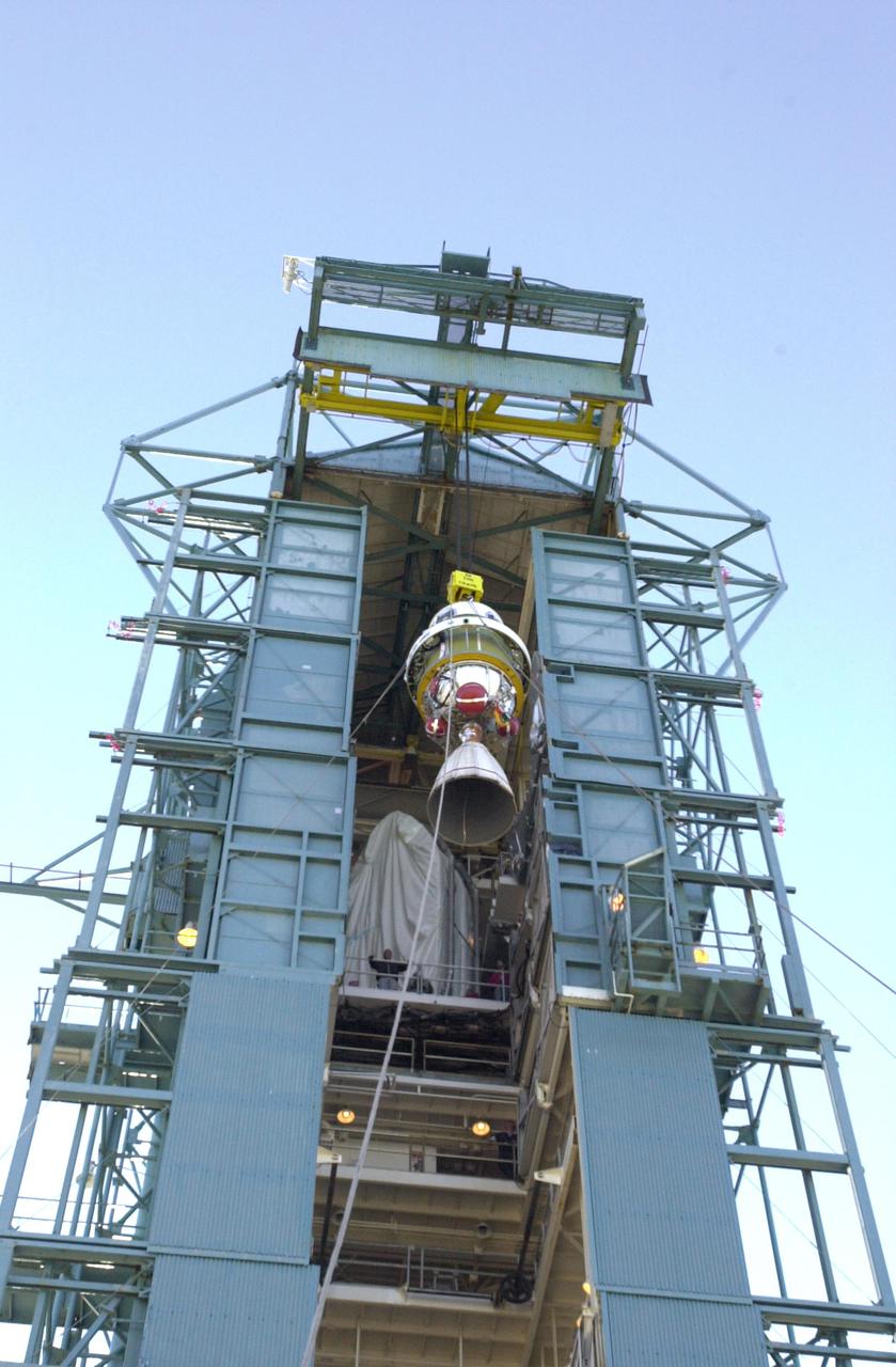 VANDENBERG AIR FORCE BASE, CALIF. - At Space Launch Complex 2 on Vandenberg Air Force Base in California, the second stage of the Boeing Delta II rocket is lifted up the service tower for mating with the first stage. The Delta II will launch the National Oceanic and Atmospheric Administration (NOAA-N) spacecraft. After launch, NOAA-N will be renamed NOAA-18 and will provide measurements of the Earth's surface and atmosphere that will be entered into NOAA’s weather forecasting models and used for other environmental studies. Each day, the satellite will send data to NOAA’s Command and Data Acquisition station computers, adding vital information to forecasting models, especially over the oceans, where conventional data is lacking. Launch of NOAA-N is scheduled for May 11, 2005.