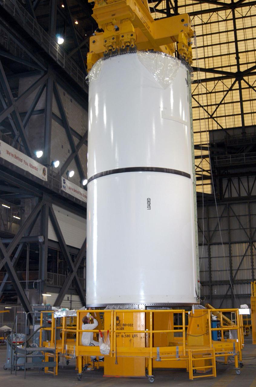 KENNEDY SPACE CENTER, FLA.  -  In the Vehicle Assembly Building at NASA’s Kennedy Space Center, workers are inspecting Solid Rocket Booster segments that will be used to launch Space Shuttle Atlantis on mission STS-121 in July.  STS-121 is a Return to Flight Utilities and Logistics Flight (ULF-2) to the International Space Station.