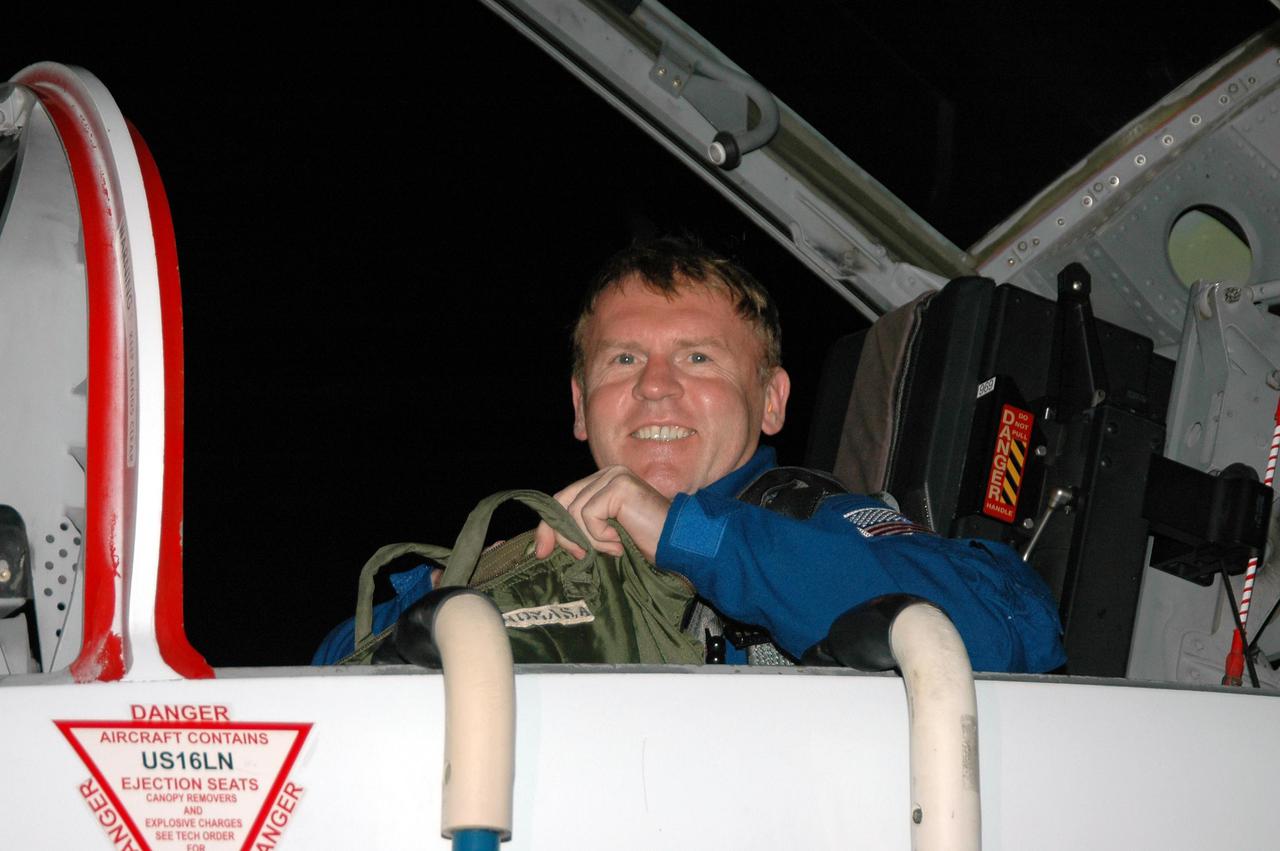 KENNEDY SPACE CENTER, FLA. - STS-114 Mission Specialist Andrew Thomas arrives at NASA’s Kennedy Space Center aboard a T-38 jet training aircraft. He and other crew members are taking part in the Terminal Countdown Demonstration Test (TCDT) over the next three days. The TCDT is held at KSC prior to each Space Shuttle flight. It provides the crew of each mission an opportunity to participate in simulated countdown activities. The test ends with a mock launch countdown culminating in a simulated main engine cutoff. The crew also spends time undergoing emergency egress training exercises at the launch pad. This is Thomas’ fourth space flight. STS-114 is the first Return to Flight mission to the International Space Station. The launch window extends July 13 through July 31.