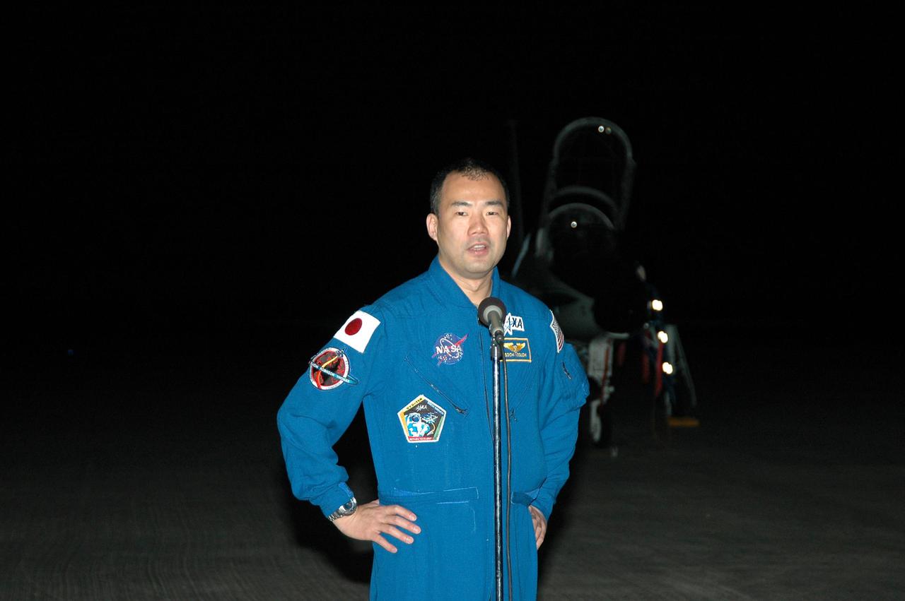 KENNEDY SPACE CENTER, FLA. - After arriving at Kennedy Space Center’s Shuttle Landing Facility, STS-114 Mission Specialist Soichi Noguchi talks to the media. Noguchi is with the Japan Aerospace Exploration Agency. He and other crew members are taking part in the Terminal Countdown Demonstration Test (TCDT) over the next three days. The TCDT is held at KSC prior to each Space Shuttle flight. It provides the crew of each mission an opportunity to participate in simulated countdown activities. The test ends with a mock launch countdown culminating in a simulated main engine cutoff. The crew also spends time undergoing emergency egress training exercises at the launch pad. This is Noguchi’s first space flight. STS-114 is the first Return to Flight mission to the International Space Station. The launch window extends July 13 through July 31.