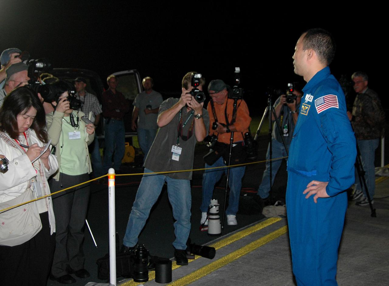 KENNEDY SPACE CENTER, FLA. - After arriving at Kennedy Space Center’s Shuttle Landing Facility, STS-114 Mission Specialist Soichi Noguchi talks to the media. Noguchi is with the Japan Aerospace Exploration Agency. He and other crew members are taking part in the Terminal Countdown Demonstration Test (TCDT) over the next three days. The TCDT is held at KSC prior to each Space Shuttle flight. It provides the crew of each mission an opportunity to participate in simulated countdown activities. The test ends with a mock launch countdown culminating in a simulated main engine cutoff. The crew also spends time undergoing emergency egress training exercises at the launch pad. This is Noguchi’s first space flight. STS-114 is the first Return to Flight mission to the International Space Station. The launch window extends July 13 through July 31.