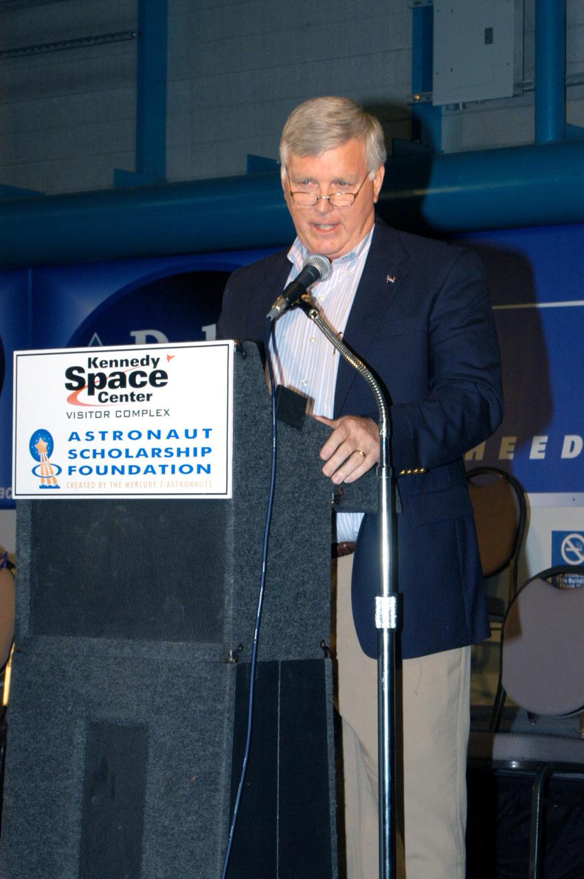 KENNEDY SPACE CENTER, FLA. -  Kennedy Space Center Director Jim Kennedy talks to inductees and guests at the Astronaut Hall of Fame Induction ceremony held in Kennedy Space Center Visitor Complex’s Apollo_Saturn V Center. The new inductees are Bruce McCandless, Joe Allen and Gordon Fullerton.  Recognized for their individual flight accomplishments and contributions to the success and future success of the U.S. space program, this elite group of inductees is among only 60 astronauts to be honored in the Hall of Fame and the fourth group of Space Shuttle astronauts named.