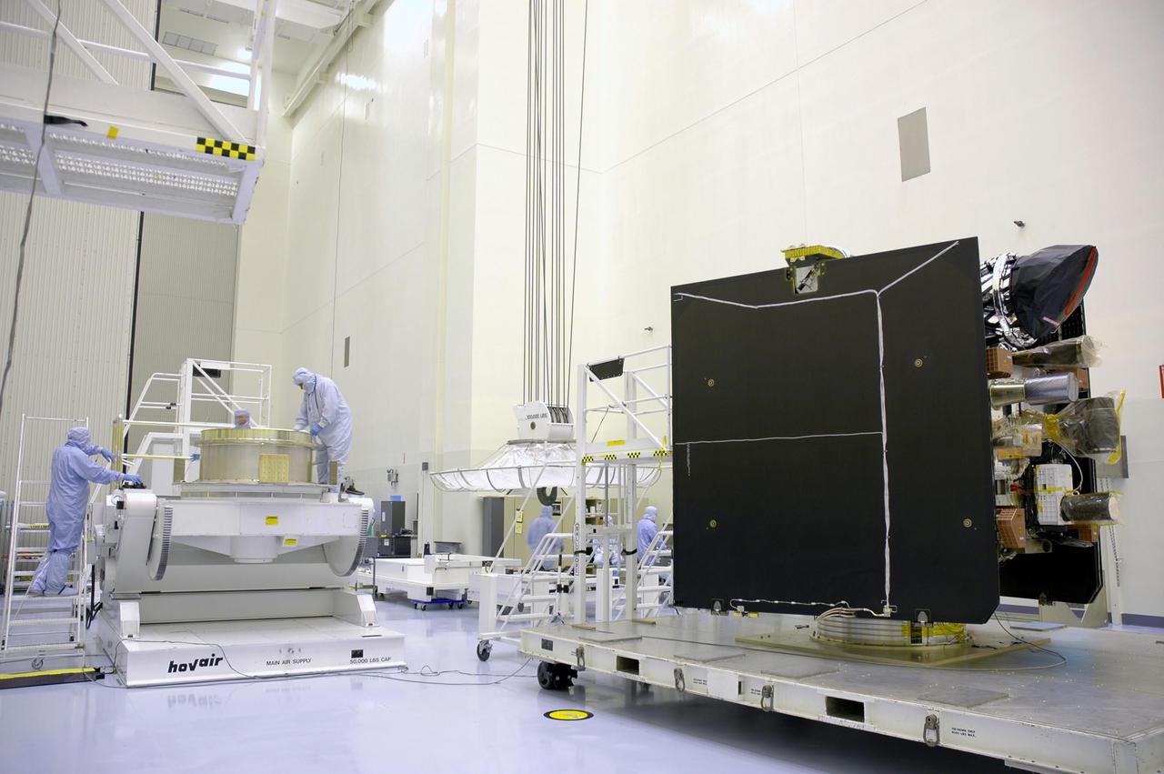 KENNEDY SPACE CENTER, FLA. - In a clean room inside the Payload Hazardous Servicing Facility (PHSF) at NASA's Kennedy Space Center,  the Lockheed Martin-built Mars Reconnaissance Orbiter (MRO) is ready to be moved to a nearby workstand for final assembly and testing. In the PHSF, the spacecraft will undergo multiple mechanical assembly operations and electrical tests to verify its readiness for launch. A test this month will verify the spacecraft's ability to communicate through NASA's Deep Space Network tracking stations. A June test will check the deployment of the spacecraft's high gain communications antenna. Another major deployment test will check out the spacecraft's large solar arrays.  The MRO was built for NASA's Jet Propulsion Laboratory in California.  It is the next major step in Mars exploration and scheduled for launch from Cape Canaveral Air Force Station in a window opening Aug. 10. The MRO is an important next step in fulfilling NASA's vision of space exploration and ultimately sending human explorers to Mars and beyond.