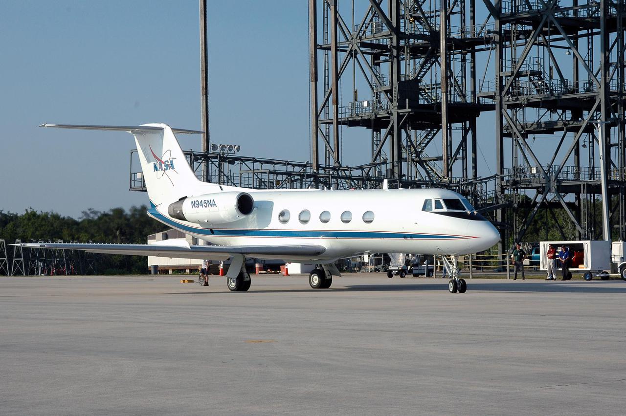 KENNEDY SPACE CENTER, FLA. -  A Shuttle Training Aircraft (STA) is ready for STS-114 Commander Eileen Collins to begin practice landing the orbiter.  The STA is a modified Grumman American Aviation-built Gulfstream II executive jet that was modified to simulate an orbiter’s cockpit, motion and visual cues, and handling qualities.  In flight, the STA duplicates the orbiter’s atmospheric descent trajectory from approximately 35,000 feet altitude to landing on a runway. The orbiter differs in at least one major aspect from conventional aircraft; it is unpowered during re-entry and landing so its high-speed glide must be perfectly executed the first time. There is no go-around capability. The orbiter touchdown speed is 213 to 226 miles per hour. There are two STAs, based in Houston. STS-114 is the first Return to Flight mission, scheduled to launch July 13 in a window that extends through July 31.