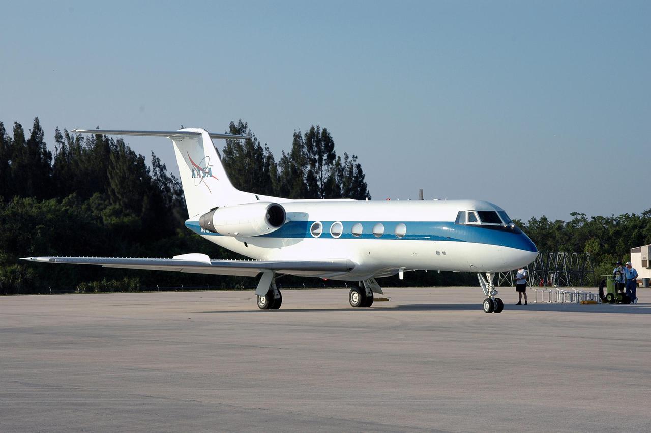 KENNEDY SPACE CENTER, FLA. -  A Shuttle Training Aircraft (STA) is ready for STS-114 Pilot James Kelly  to begin practice landing the orbiter.  The STA is a modified Grumman American Aviation-built Gulfstream II executive jet that was modified to simulate an orbiter’s cockpit, motion and visual cues, and handling qualities.  In flight, the STA duplicates the orbiter’s atmospheric descent trajectory from approximately 35,000 feet altitude to landing on a runway. The orbiter differs in at least one major aspect from conventional aircraft; it is unpowered during re-entry and landing so its high-speed glide must be perfectly executed the first time. There is no go-around capability. The orbiter touchdown speed is 213 to 226 miles per hour. There are two STAs, based in Houston. STS-114 is the first Return to Flight mission, scheduled to launch July 13 in a window that extends through July 31.