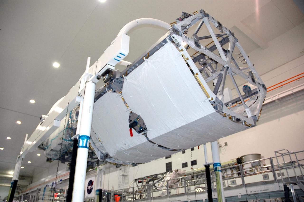 KENNEDY SPACE CENTER, FLA. - In the Space Station Processing Facility at NASA’s Kennedy Space Center, the P3_P4 Truss is prepared to be rotated to the upper deck position in preparation for installation of the upper deck solar array wing. The truss is scheduled to launch on mission 12A, STS-115, to the International Space Station. The wing was removed to replace aging flight batteries. New batteries are being installed to ensure that the batteries do not exceed their lifetime expectancy prior to their planned logistics resupply on-orbit. The new batteries have a lifetime expectancy of approximately 7 years.