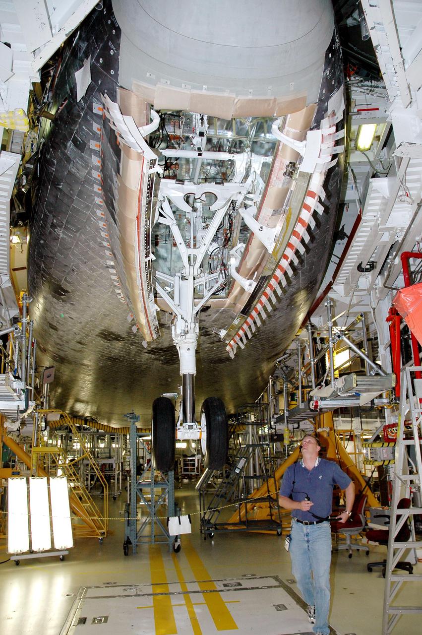 KENNEDY SPACE CENTER, FLA. - In the Orbiter Processing Facility bay 1 at NASA’s Kennedy Space Center in Florida, Atlantis’ nose wheels are cycled to test compression of the new Thermal Protection System seal.  Processing continues on Atlantis for mission STS-121 to the International Space Station.  The second Return to Flight mission, STS-121 is scheduled for liftoff in a launch window extending from Sept. 9 - 24.