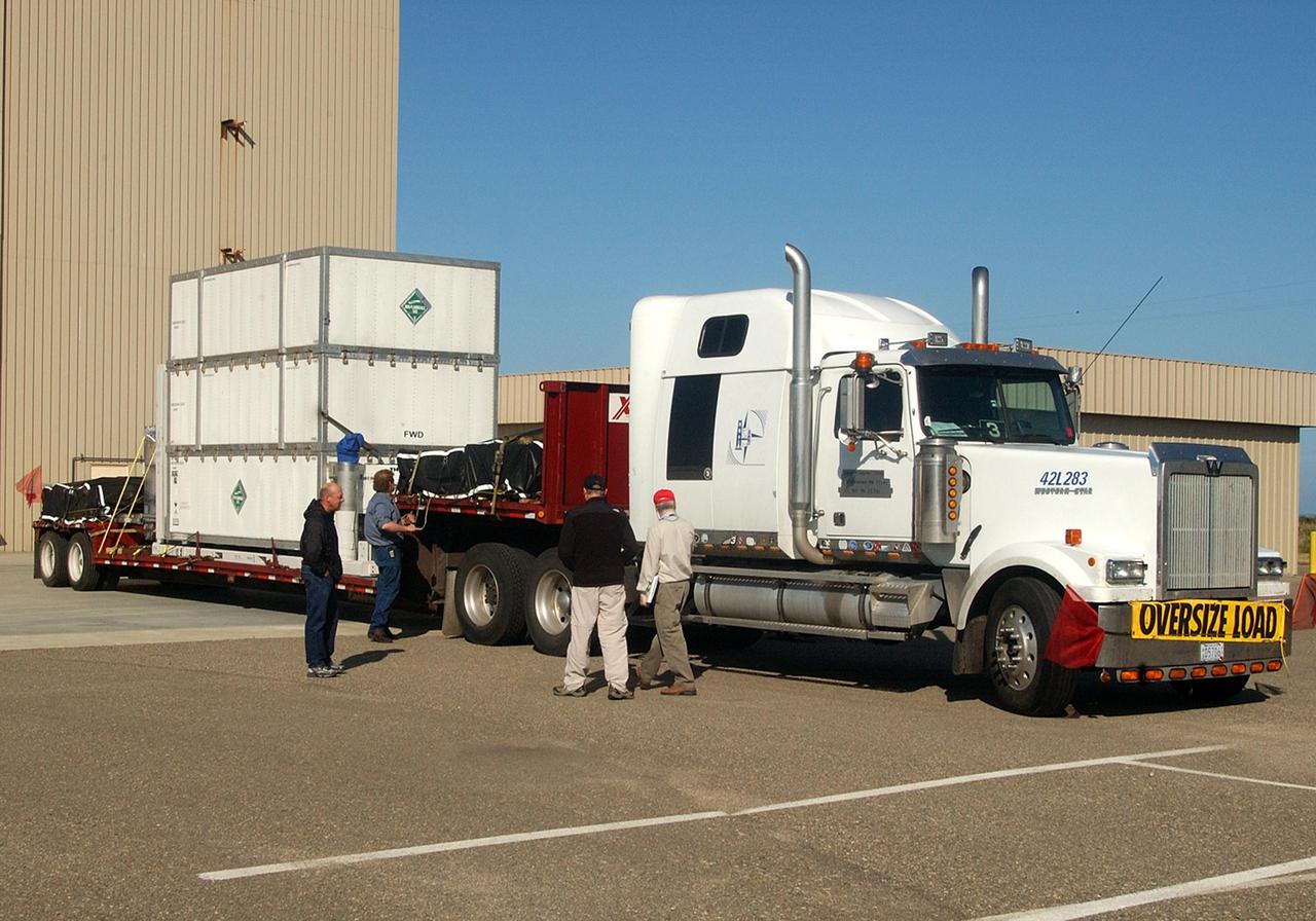 KENNEDY SPACE CENTER, FLA.  - The CloudSat spacecraft arrives via truck at the Astrotech Payload Processing Facility on Vandenberg Air Force Base in California from Ball Aerospace and Technologies Corp. in Boulder, Colo.   CloudSat will undergo electrical and spacecraft transmitter testing.  In combination with the Cloud-Aerosol Lidar and Infrared Pathfinder Satellite Observation (CALIPSO), the spacecraft will provide never-before-seen 3-D perspectives of how clouds and aerosols form, evolve, and affect weather and climate. CALIPSO and CloudSat will fly in formation with three other satellites to enhance understanding of climate systems.  The launch date for CloudSat_CALIPSO is no earlier than Aug. 22.