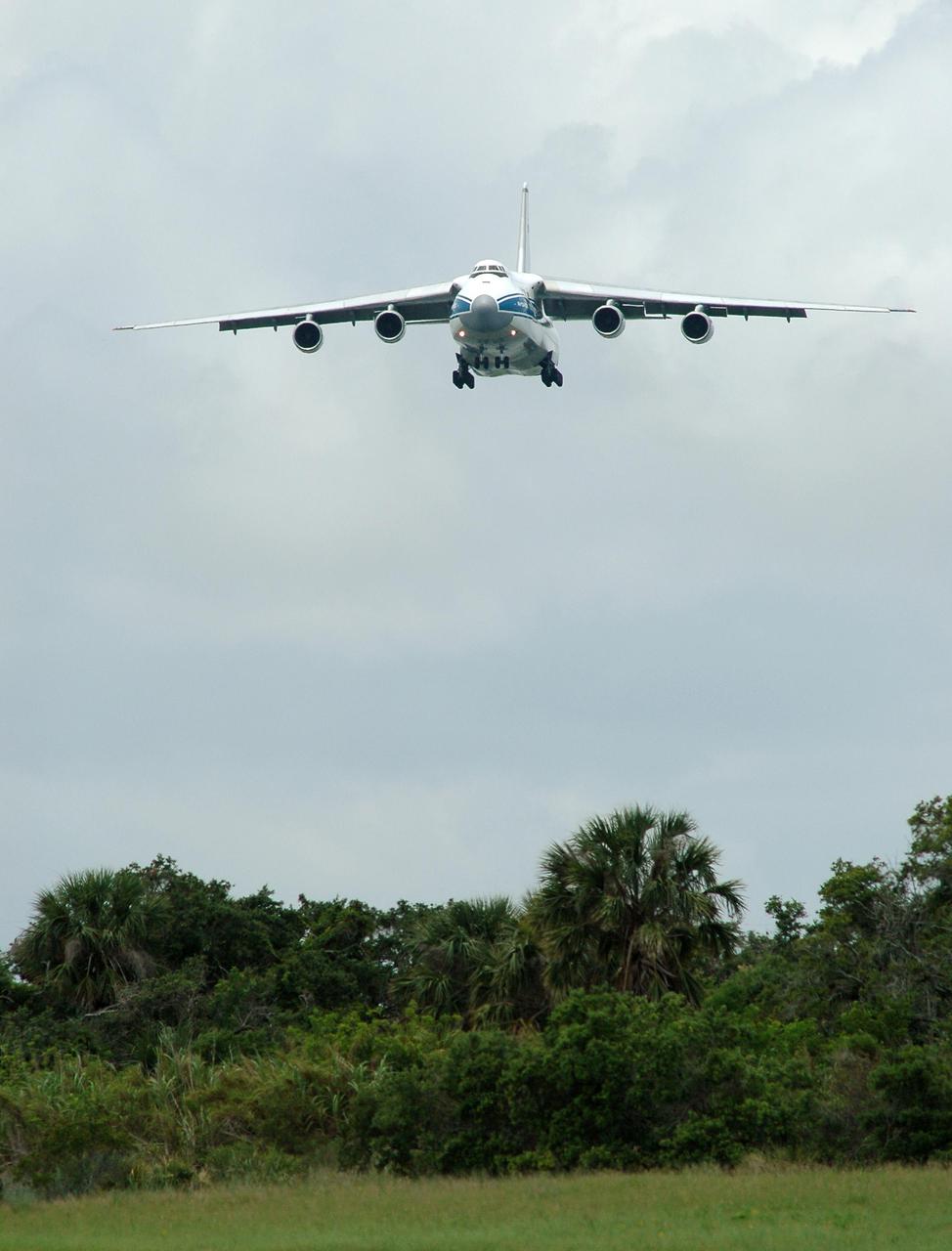 KENNEDY SPACE CENTER, FLA.  -  A Russian Antonov AH-124-100 cargo airplane heads for a landing at the Cape Canaveral Air Force Station Skid Strip.  The plane is delivering a second stage Centaur (Block I) for the Lockheed Martin Atlas V, designated AV-007, that is the launch vehicle for the Mars Reconnaissance Orbiter (MRO). The MRO is designed for a series of global mapping, regional survey and targeted observations from a near-polar, low-altitude Mars orbit. These observations will be unprecedented in terms of the spatial resolution and coverage achieved by the orbiter’s instruments as they observe the atmosphere and surface of Mars while probing its shallow subsurface as part of a “follow the water” strategy.  The orbiter is undergoing environmental tests in facilities at Lockheed Martin Space Systems in Denver, Colo., and is on schedule for a launch window that begins Aug. 10. Launch will be from Launch Complex 41 at Cape Canaveral Air Force Station in Florida.