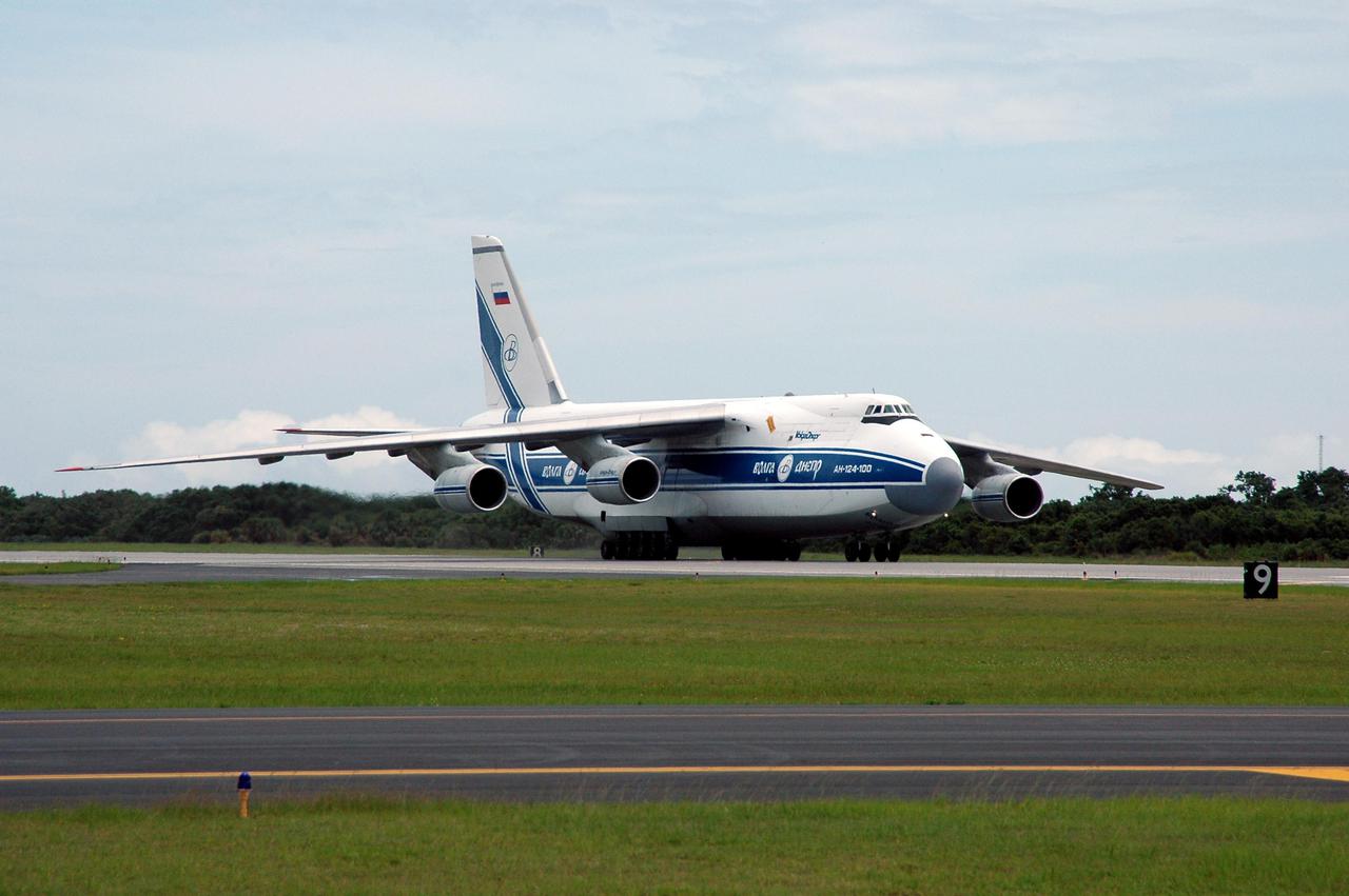 KENNEDY SPACE CENTER, FLA.  -  A Russian Antonov AH-124-100 cargo airplane lands at the Cape Canaveral Air Force Station Skid Strip.  The plane is delivering a second stage Centaur (Block I) for the Lockheed Martin Atlas V, designated AV-007, that is the launch vehicle for the Mars Reconnaissance Orbiter (MRO). The MRO is designed for a series of global mapping, regional survey and targeted observations from a near-polar, low-altitude Mars orbit. These observations will be unprecedented in terms of the spatial resolution and coverage achieved by the orbiter’s instruments as they observe the atmosphere and surface of Mars while probing its shallow subsurface as part of a “follow the water” strategy.  The orbiter is undergoing environmental tests in facilities at Lockheed Martin Space Systems in Denver, Colo., and is on schedule for a launch window that begins Aug. 10. Launch will be from Launch Complex 41 at Cape Canaveral Air Force Station in Florida.
