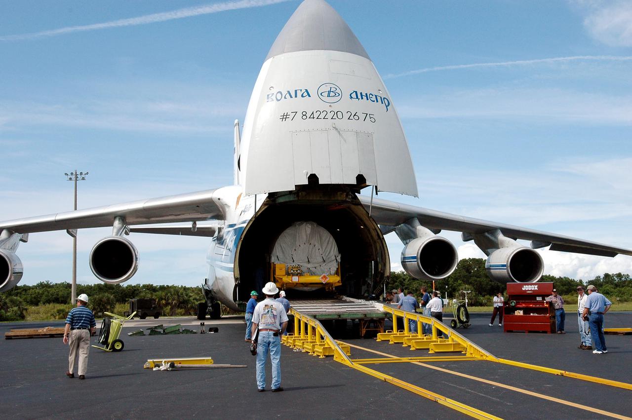 KENNEDY SPACE CENTER, FLA.  -  At the Cape Canaveral Air Force Station Skid Strip, a second stage Centaur (Block I) is ready to be offloaded from a Russian Antonov AH-124-100 cargo airplane.  The Centaur will be mated with the Lockheed Martin Atlas V, designated AV-007, that is the launch vehicle for the Mars Reconnaissance Orbiter (MRO).  The MRO is designed for a series of global mapping, regional survey and targeted observations from a near-polar, low-altitude Mars orbit. These observations will be unprecedented in terms of the spatial resolution and coverage achieved by the orbiter’s instruments as they observe the atmosphere and surface of Mars while probing its shallow subsurface as part of a “follow the water” strategy.  The orbiter is undergoing environmental tests in facilities at Lockheed Martin Space Systems in Denver, Colo., and is on schedule for a launch window that begins Aug. 10. Launch will be from Launch Complex 41 at Cape Canaveral Air Force Station in Florida.