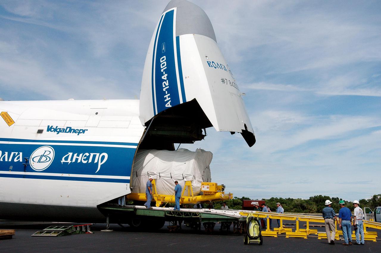 KENNEDY SPACE CENTER, FLA.  -  At the Cape Canaveral Air Force Station Skid Strip, a second stage Centaur (Block I) is rolled out of a Russian Antonov AH-124-100 cargo airplane.  The Centaur will be mated with the Lockheed Martin Atlas V, designated AV-007, that is the launch vehicle for the Mars Reconnaissance Orbiter (MRO).  The MRO is designed for a series of global mapping, regional survey and targeted observations from a near-polar, low-altitude Mars orbit. These observations will be unprecedented in terms of the spatial resolution and coverage achieved by the orbiter’s instruments as they observe the atmosphere and surface of Mars while probing its shallow subsurface as part of a “follow the water” strategy.  The orbiter is undergoing environmental tests in facilities at Lockheed Martin Space Systems in Denver, Colo., and is on schedule for a launch window that begins Aug. 10. Launch will be from Launch Complex 41 at Cape Canaveral Air Force Station in Florida.