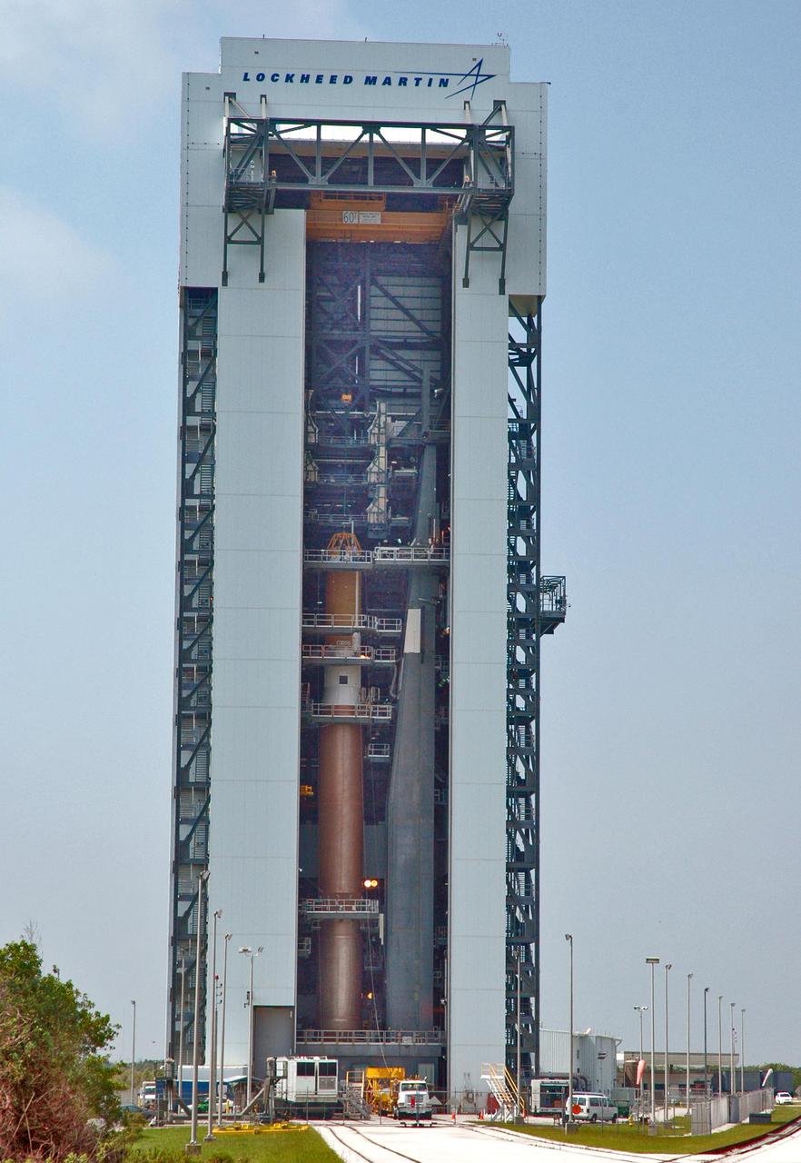 KENNEDY SPACE CENTER, FLA. - Inside the launch tower on Launch Pad 41 at Cape Canaveral Air Force Station in Florida, the upper end of the Lockheed Martin Centaur second stage is being lowered through an opening toward the Atlas V below. The Centaur will be mated with the Atlas V. The Atlas V_Centaur is the launch vehicle for the Mars Reconnaissance Orbiter (MRO). The MRO is designed for a series of global mapping, regional survey and targeted observations from a near-polar, low-altitude Mars orbit. These observations will be unprecedented in terms of the spatial resolution and coverage achieved by the orbiter’s instruments as they observe the atmosphere and surface of Mars while probing its shallow subsurface as part of a “follow the water” strategy. The launch window for the MRO begins Aug. 10.