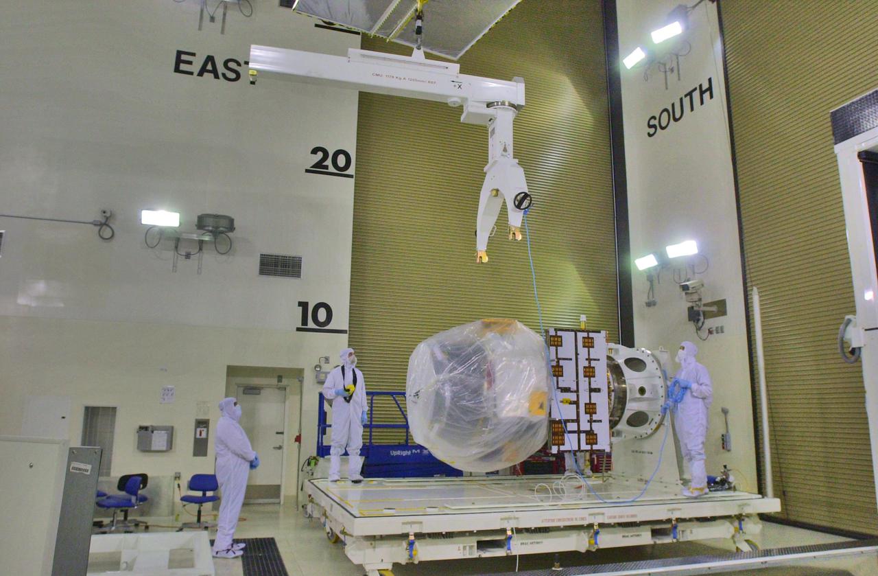KENNEDY SPACE CENTER, FLA. - Inside the Astrotech Payload Processing Facility on Vandenberg Air Force Base in California, the Cloud-Aerosol Lidar and Infrared Pathfinder Satellite Observation (CALIPSO) spacecraft waits to be transferred from a tilt dolly to a workstand. It will undergo state-of-health checks, and electrical ground-support equipment testing. CALIPSO will fly in combination with the CloudSat satellite to provide never-before-seen 3-D perspectives of how clouds and aerosols form, evolve, and affect weather and climate. CALIPSO and CloudSat will join three other satellites in orbit to enhance understanding of climate systems. The launch date for CALIPSO_CloudSat is no earlier than Aug. 22.