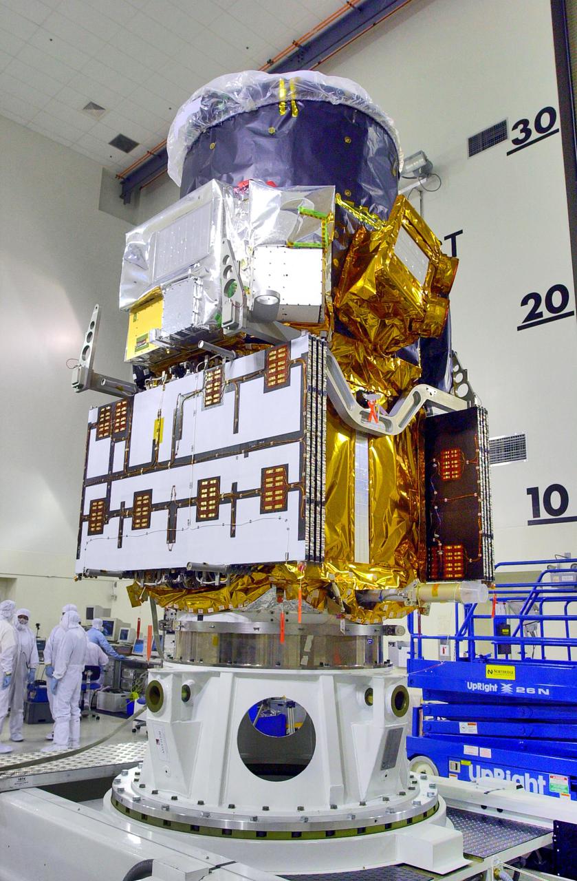 KENNEDY SPACE CENTER, FLA. - Inside the Astrotech Payload Processing Facility on Vandenberg Air Force Base in California, the Cloud-Aerosol Lidar and Infrared Pathfinder Satellite Observation (CALIPSO) spacecraft has been raised to vertical. It will be lifted and transferred to a workstand. CALIPSO will undergo state-of-health checks, and electrical ground-support equipment testing. CALIPSO will fly in combination with the CloudSat satellite to provide never-before-seen 3-D perspectives of how clouds and aerosols form, evolve, and affect weather and climate. CALIPSO and CloudSat will join three other satellites in orbit to enhance understanding of climate systems. The launch date for CALIPSO_CloudSat is no earlier than Aug. 22.
