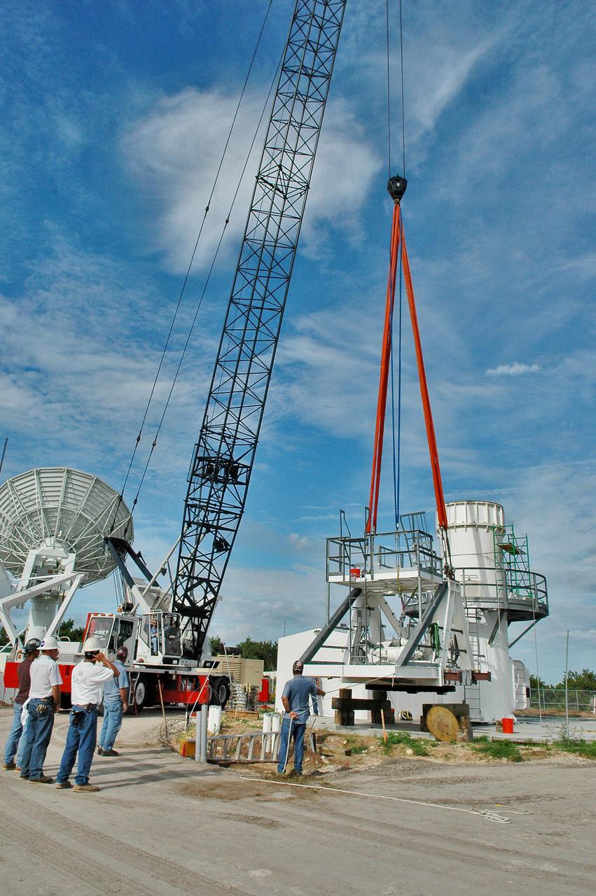 KENNEDY SPACE CENTER, FLA. - Work is underway on a radar site on North Merritt Island, Fla.,  constructing the support base for a 50-foot C-band radar antenna.  The radar will be used for Shuttle missions to track the launches and observe possible debris coming from the Shuttle.   It will be used for the first time on STS-114. The launch window for the first Return to Flight mission is July 13 to July 31.