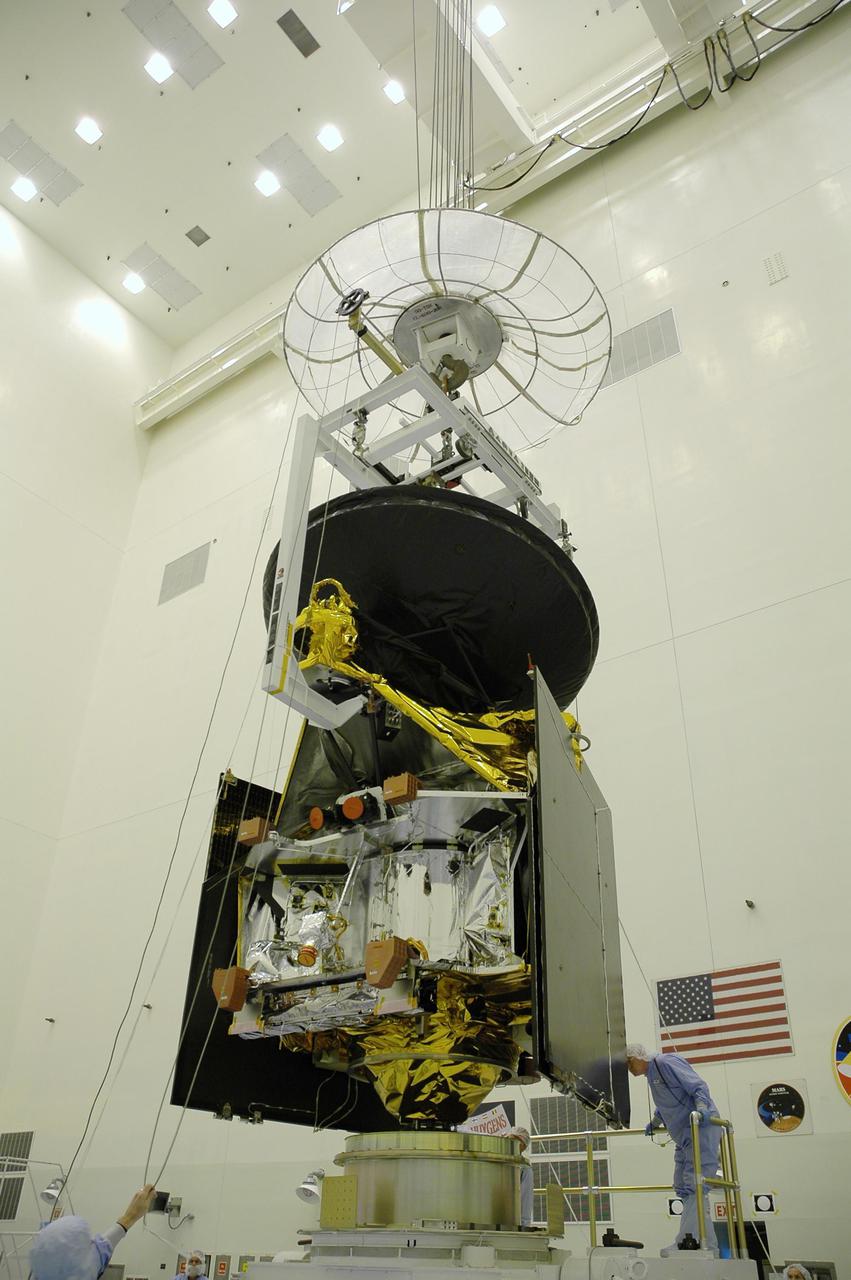 KENNEDY SPACE CENTER, FLA. - In the Payload Hazardous Servicing Facility, the Mars Reconnaissance Orbiter (MRO) has been lifted off the rotation stand and is being transferred to a Mars Orbit Insertion Thruster assembly stand for testing. In late July, the MRO will be transported to the Vertical Installation Facility. It will join the Atlas V for the final phase of launch preparations. The spacecraft is then scheduled to undergo a functional test, and a final week of integrated testing and closeouts.  The MRO was built by Lockheed Martin for the Jet Propulsion Laboratory in California.  It is the next major step in Mars exploration and scheduled for launch from Cape Canaveral Air Force Station in a window opening Aug. 10. The MRO is an important next step in fulfilling NASA’s vision of space exploration and ultimately sending human explorers to Mars and beyond.