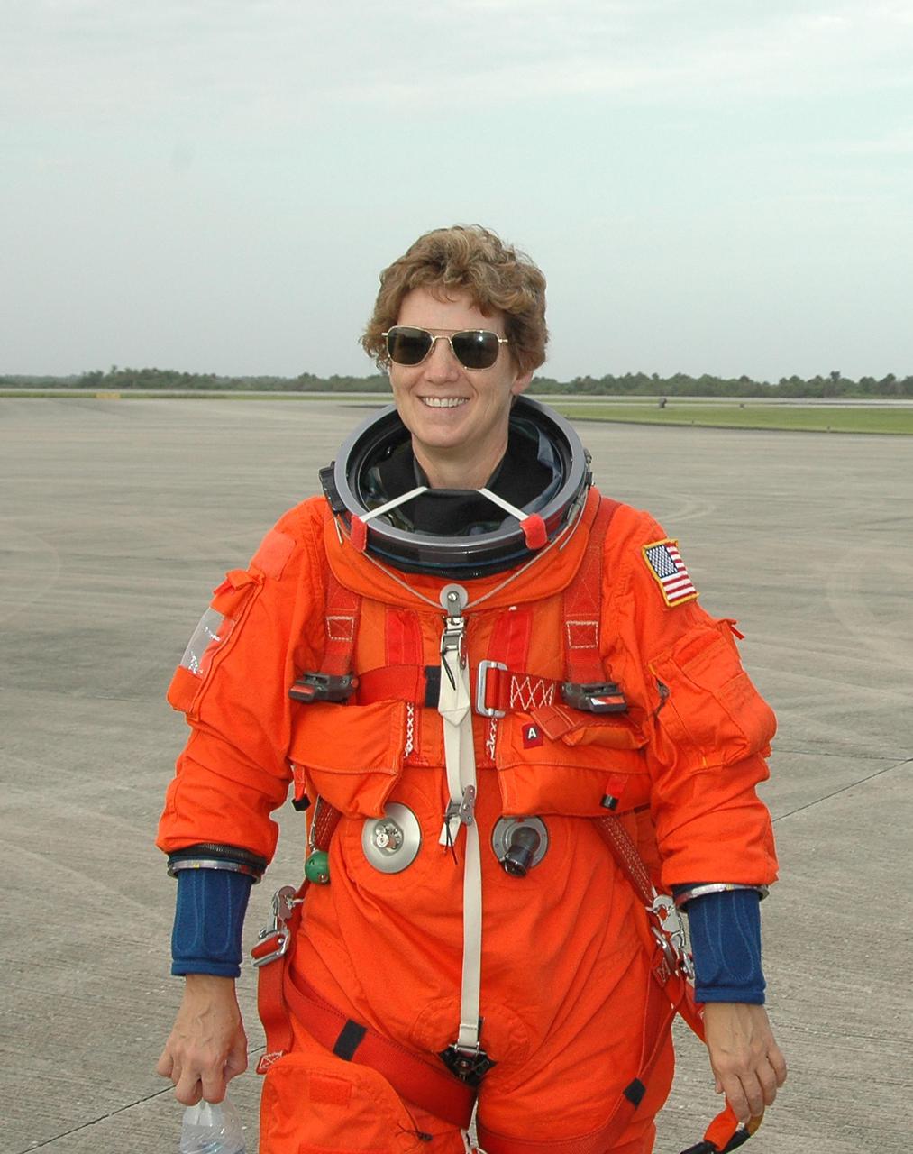 KENNEDY SPACE CENTER, FLA. -- At the Shuttle Landing Facility on NASA’s Kennedy Space Center, Return to Flight STS-114 Mission Commander Eileen Collins completes practice runs on the Shuttle Training Aircraft (STA).  She and Pilot James Kelly are practicing landing the orbiter using the STA, which is a modified Grumman American Aviation-built Gulf Stream II executive jet that was modified to simulate an orbiter’s cockpit, motion and visual cues, and handling qualities.   In flight, the STA duplicates the orbiter’s atmospheric descent trajectory from approximately 35,000 feet altitude to landing on a runway. Because the orbiter is unpowered during re-entry and landing, its high-speed glide must be perfectly executed the first time.  Mission STS-114 is scheduled to launch aboard Space Shuttle Discovery with a crew of seven on July 13 at 3:51 p.m. from Launch Pad 39B.