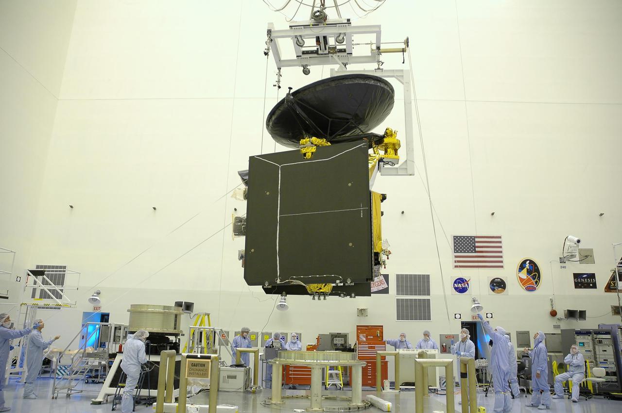 KENNEDY SPACE CENTER, FLA. -- In the Payload Hazardous Servicing Facility, the Mars Reconnaissance Orbiter (MRO) is lifted off a workstand for transfer to the spin balance machine for testing. In late July, the MRO will be transported to the Vertical Installation Facility. It will join the Atlas V for the final phase of launch preparations. The spacecraft is then scheduled to undergo a functional test, and a final week of integrated testing and closeouts. The MRO was built by Lockheed Martin for the Jet Propulsion Laboratory in California. It is the next major step in Mars exploration and scheduled for launch from Cape Canaveral Air Force Station in a window opening Aug. 10. The MRO is an important next step in fulfilling NASA’s vision of space exploration and ultimately sending human explorers to Mars and beyond.