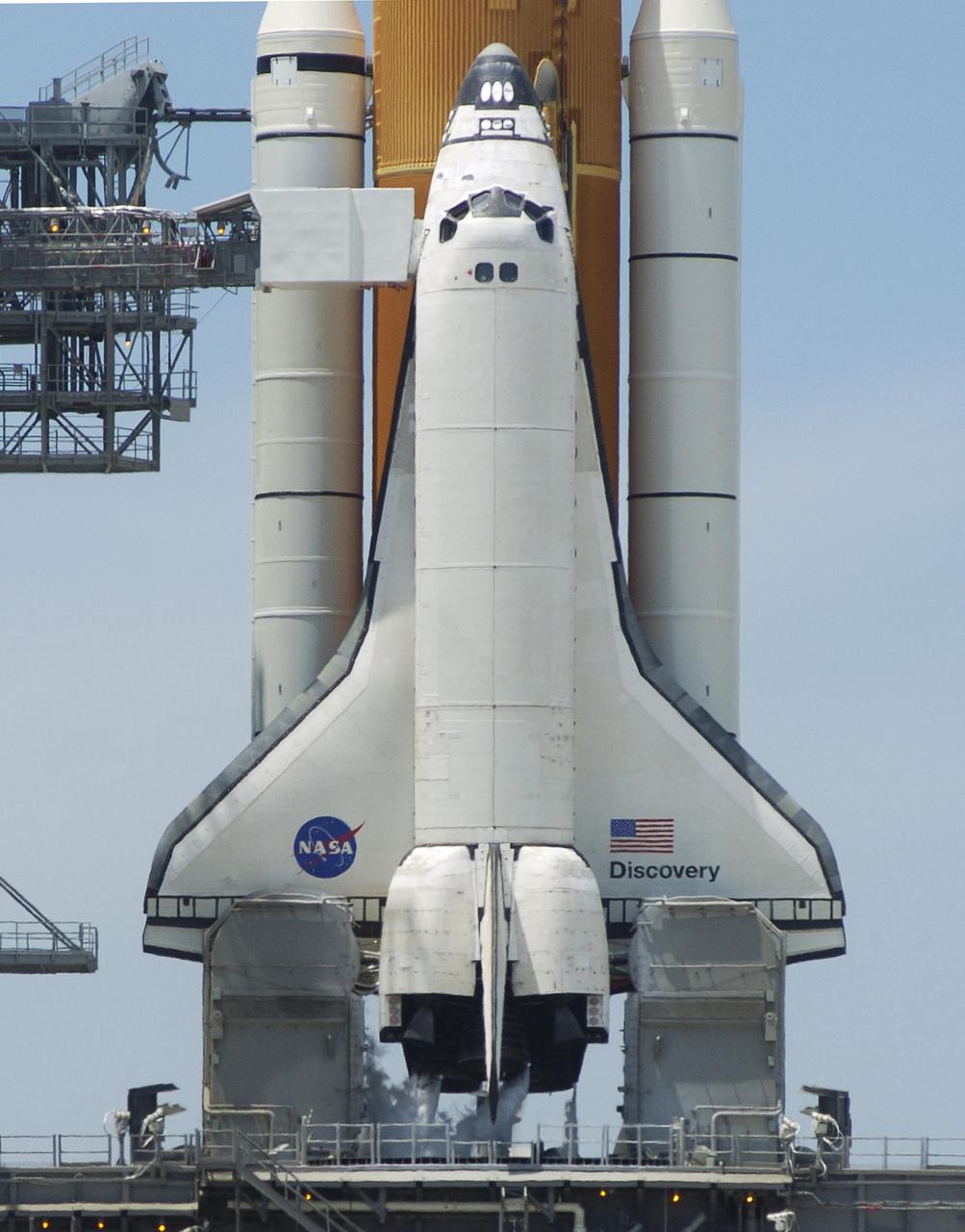 KENNEDY SPACE CENTER, FLA. - Space Shuttle Discovery remains on the launch pad at 3:51 p.m. EDT, the scheduled time of liftoff for Return to Flight mission STS-114. The launch was scrubbed due to a faulty sensor reading in the External Tank during countdown. The Mission Management Team is testing the sensor and evaluating future launch options. (Photo courtesy of Scott Andrews)