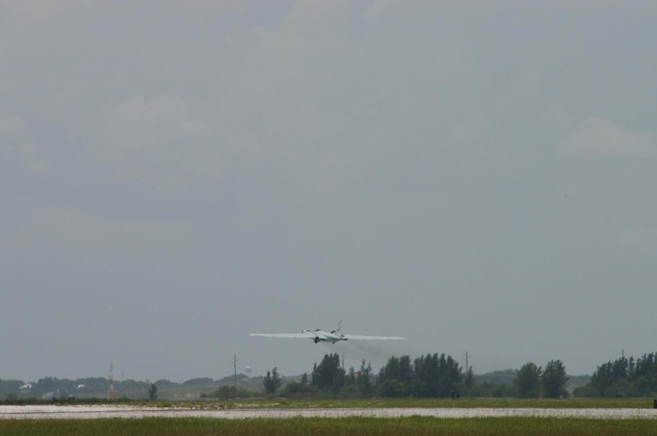 KENNEDY SPACE CENTER, FLA. -  At Patrick Air Force Base in Cocoa Beach, Fla., the WB-57F aircraft takes off on a test flight.  The aircraft will take photos of Space Shuttle Discovery during its launch on Return to Flight mission STS-114.  NASA approved the development and implementation of the aircraft-based imaging system, known as the WB-57 Ascent Video Experiment (WAVE).  The WAVE provides both ascent and entry imagery and enables better observation of the Shuttle on days of heavier cloud cover and areas obscured from ground cameras by the launch exhaust plume. WAVE comprises a 32-inch-ball turret system mounted on the nose of two WB-57 aircraft. The turret houses an optical bench, providing installation of both HDTV and infrared cameras. Optics consist of an 11-inch-diameter, 4.2 meter fixed-focal-length lens. The system can be operated in both auto track and manual modes.